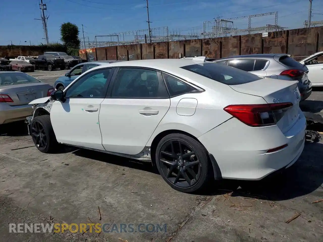2 fotografías del automóvil dañado 2HGFE2F55NH556688 HONDA CIVIC 2022