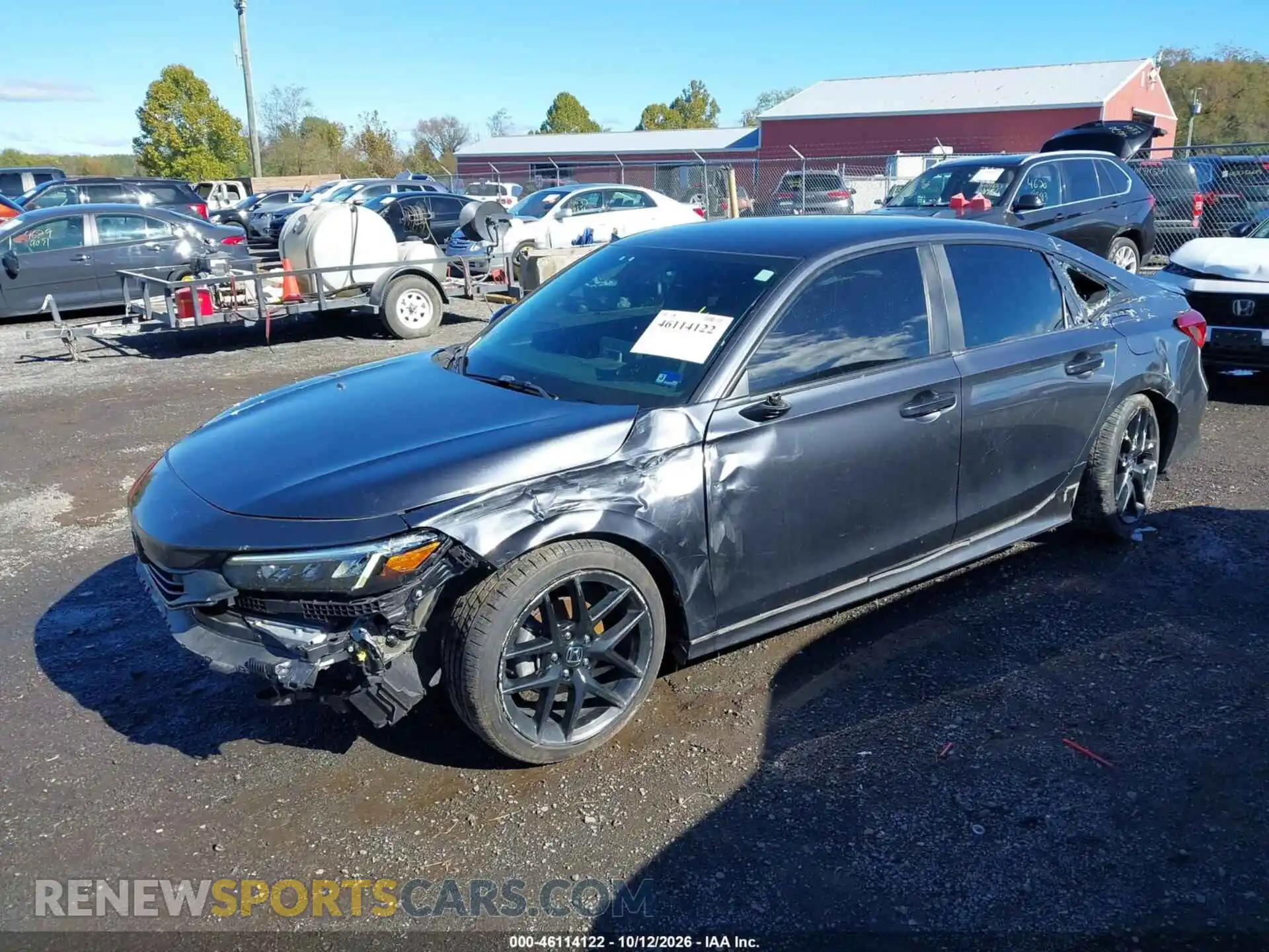 2 fotografías del automóvil dañado 2HGFE2F57NH522204 HONDA CIVIC 2022