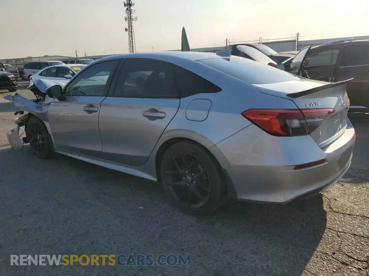 2 fotografías del automóvil dañado 2HGFE2F59NH593520 HONDA CIVIC 2022