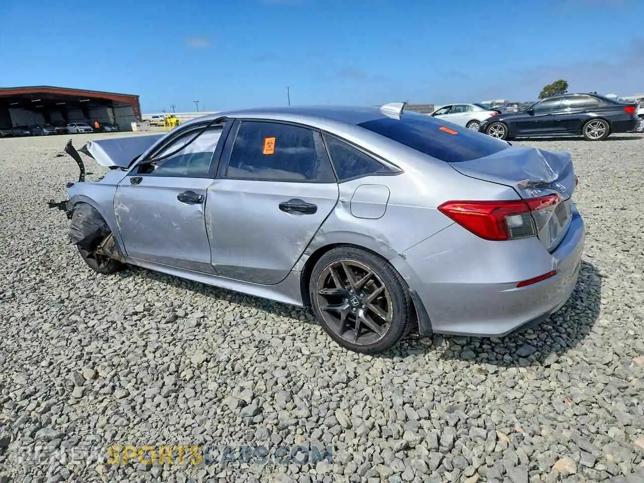2 fotografías del automóvil dañado 2HGFE2F5XNH530569 HONDA CIVIC 2022