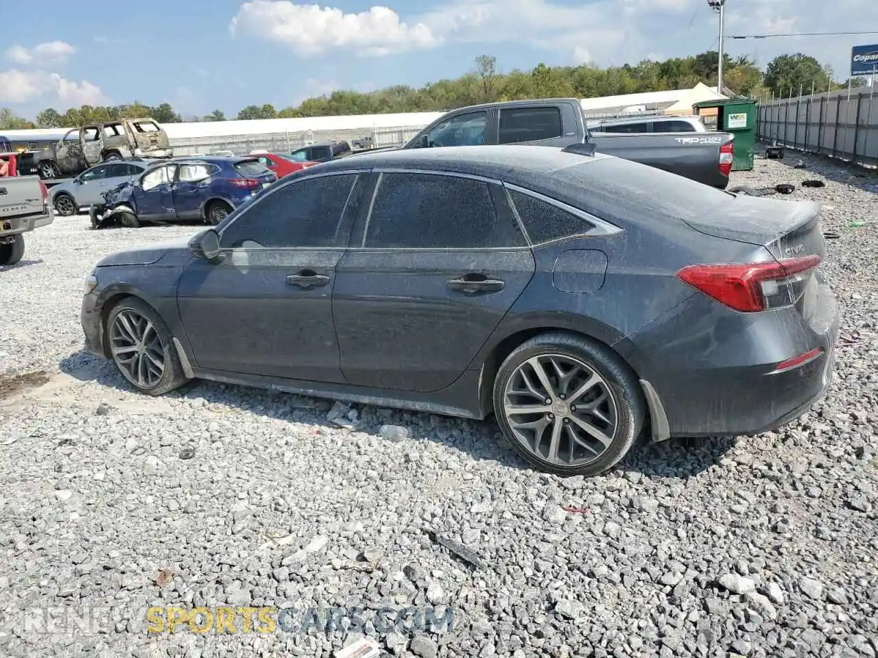 2 fotografías del automóvil dañado 2HGFE1F97PH302142 HONDA CIVIC 2023