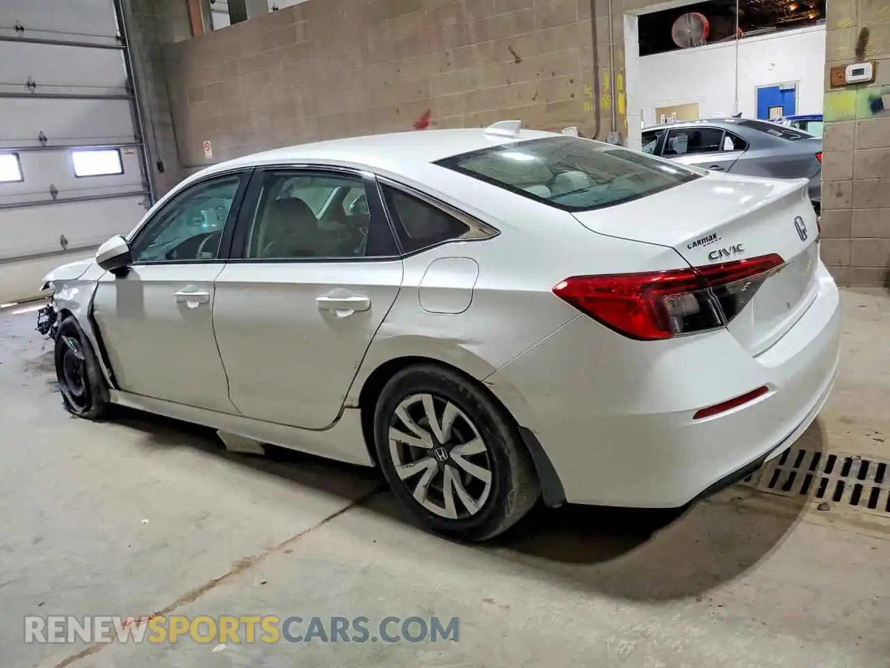 2 fotografías del automóvil dañado 2HGFE2F23PH541809 HONDA CIVIC 2023