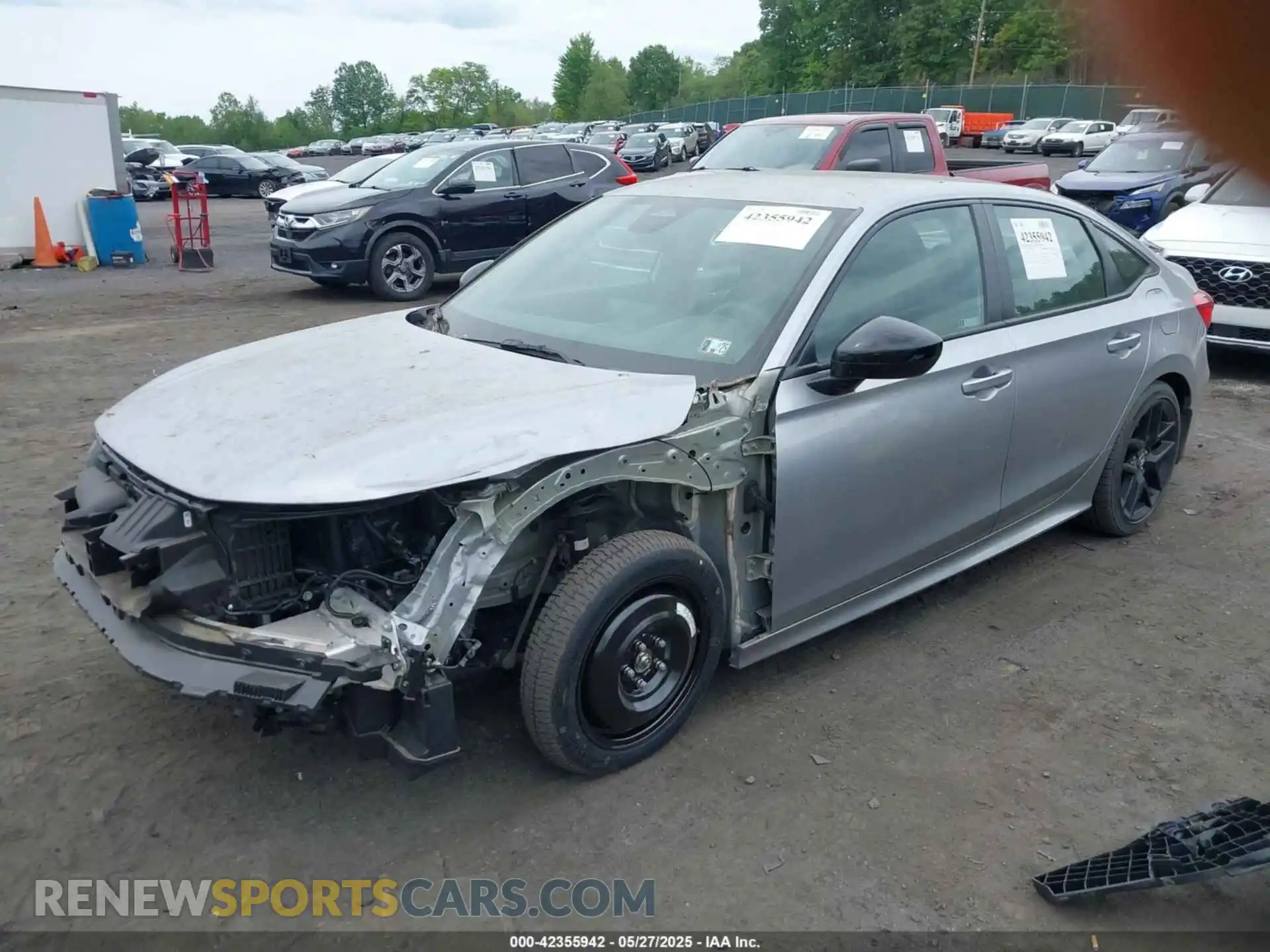 2 fotografías del automóvil dañado 2HGFE2F55PH501595 HONDA CIVIC 2023