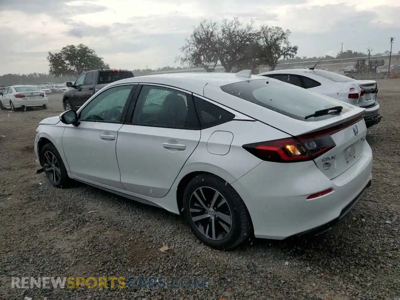 2 fotografías del automóvil dañado 19XFL2H57RE014740 HONDA CIVIC 2024