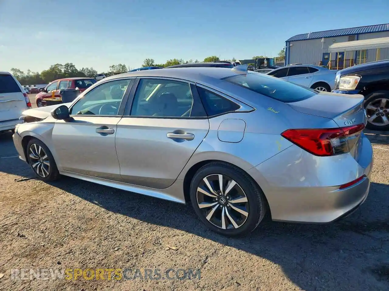 2 fotografías del automóvil dañado 2HGFE1F71RH310058 HONDA CIVIC 2024