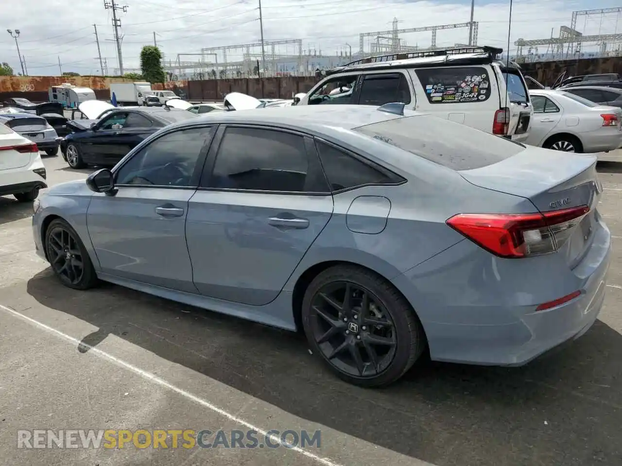 2 fotografías del automóvil dañado 2HGFE2F58RH588380 HONDA CIVIC 2024