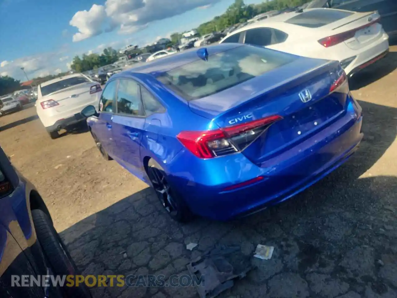 2 fotografías del automóvil dañado 2HGFE2F59RH544081 HONDA CIVIC 2024