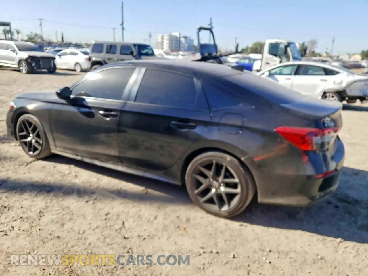 2 fotografías del automóvil dañado 2HGFE2F59RH593636 HONDA CIVIC 2024
