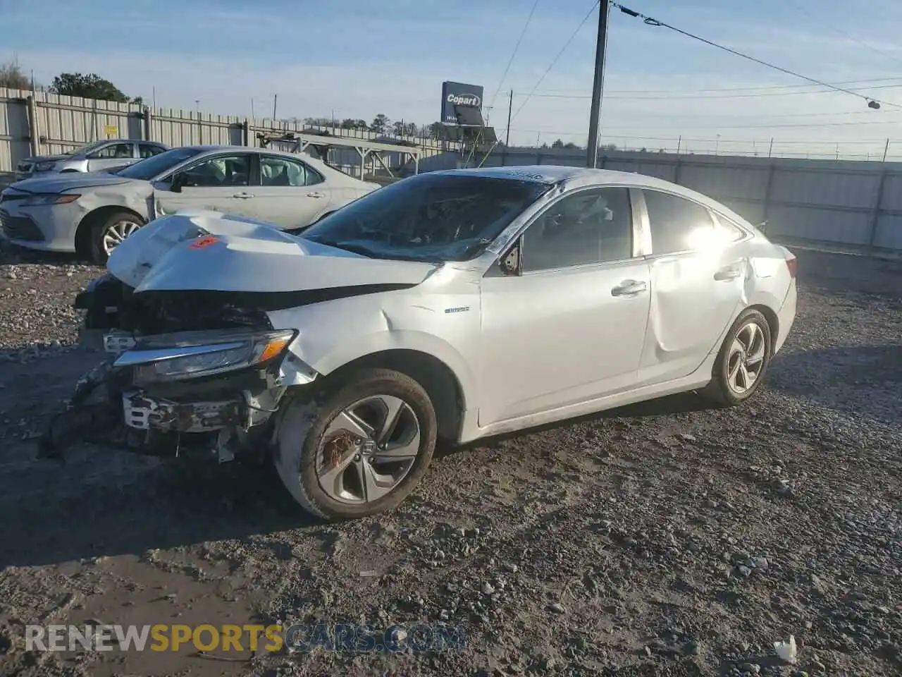 1 Фотография поврежденного автомобиля 19XZE4F53LE009595 HONDA INSIGHT 2020