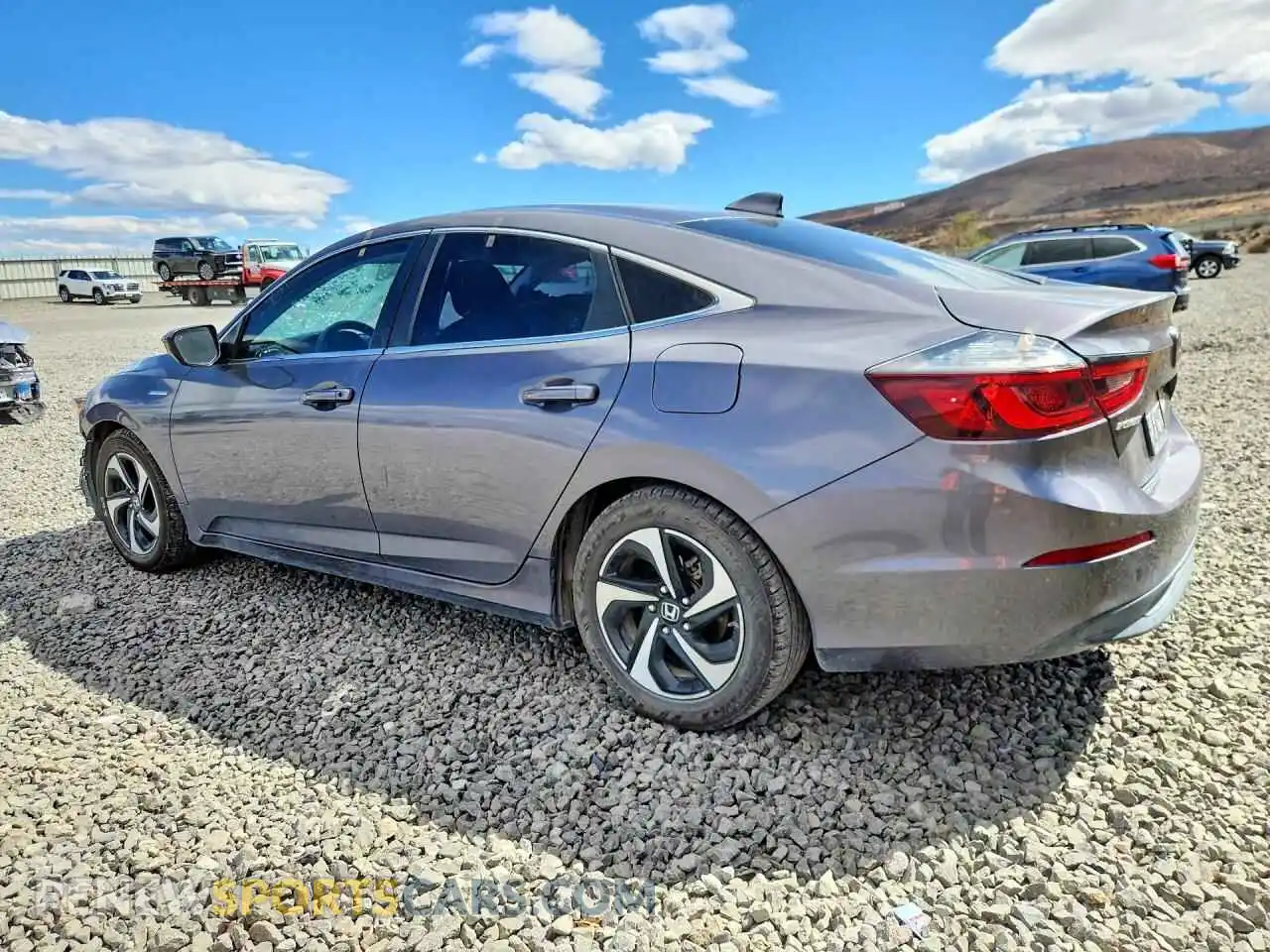 2 Фотография поврежденного автомобиля 19XZE4F52ME011310 HONDA INSIGHT 2021