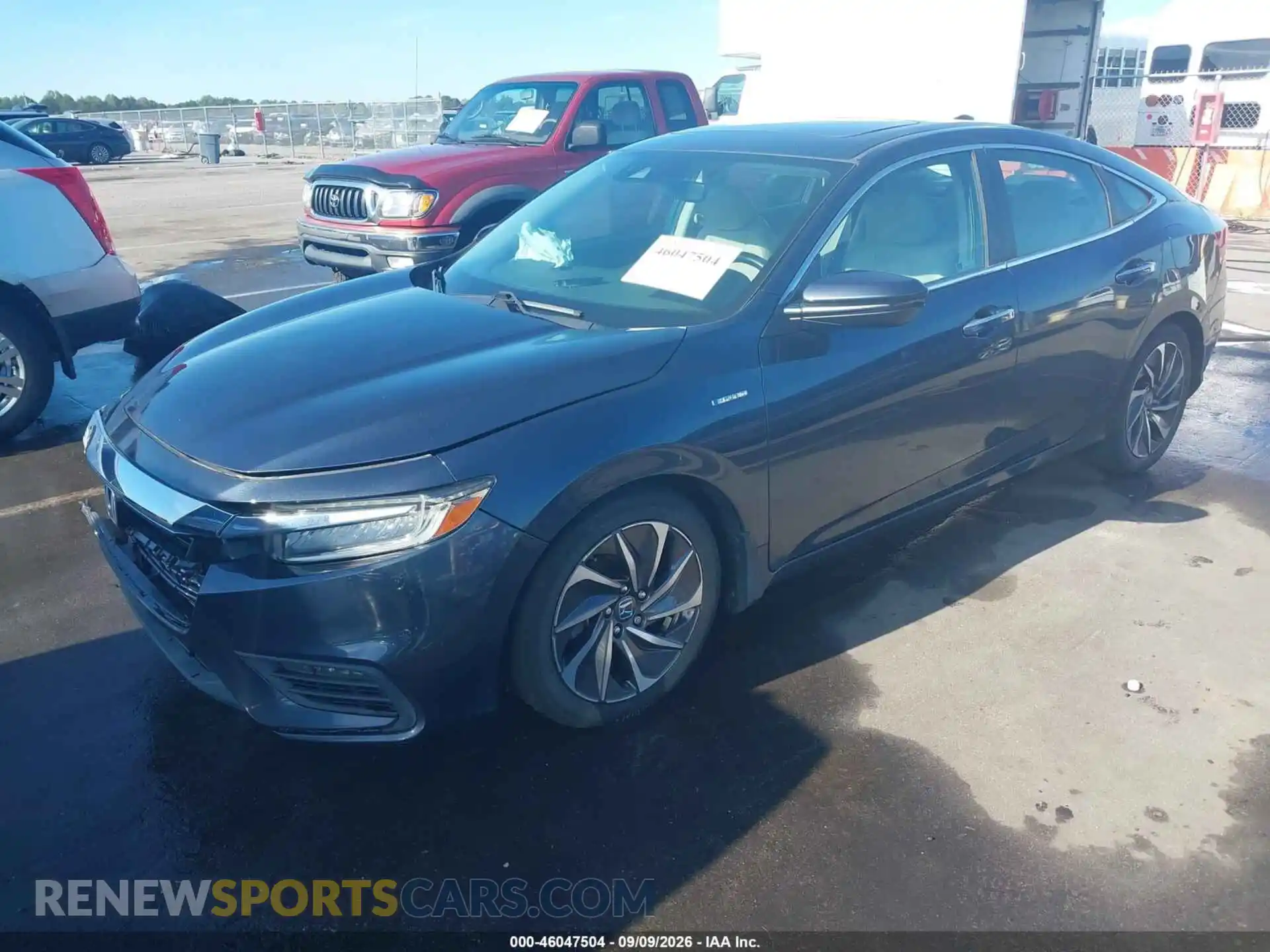 2 Фотография поврежденного автомобиля 19XZE4F98ME007393 HONDA INSIGHT 2021