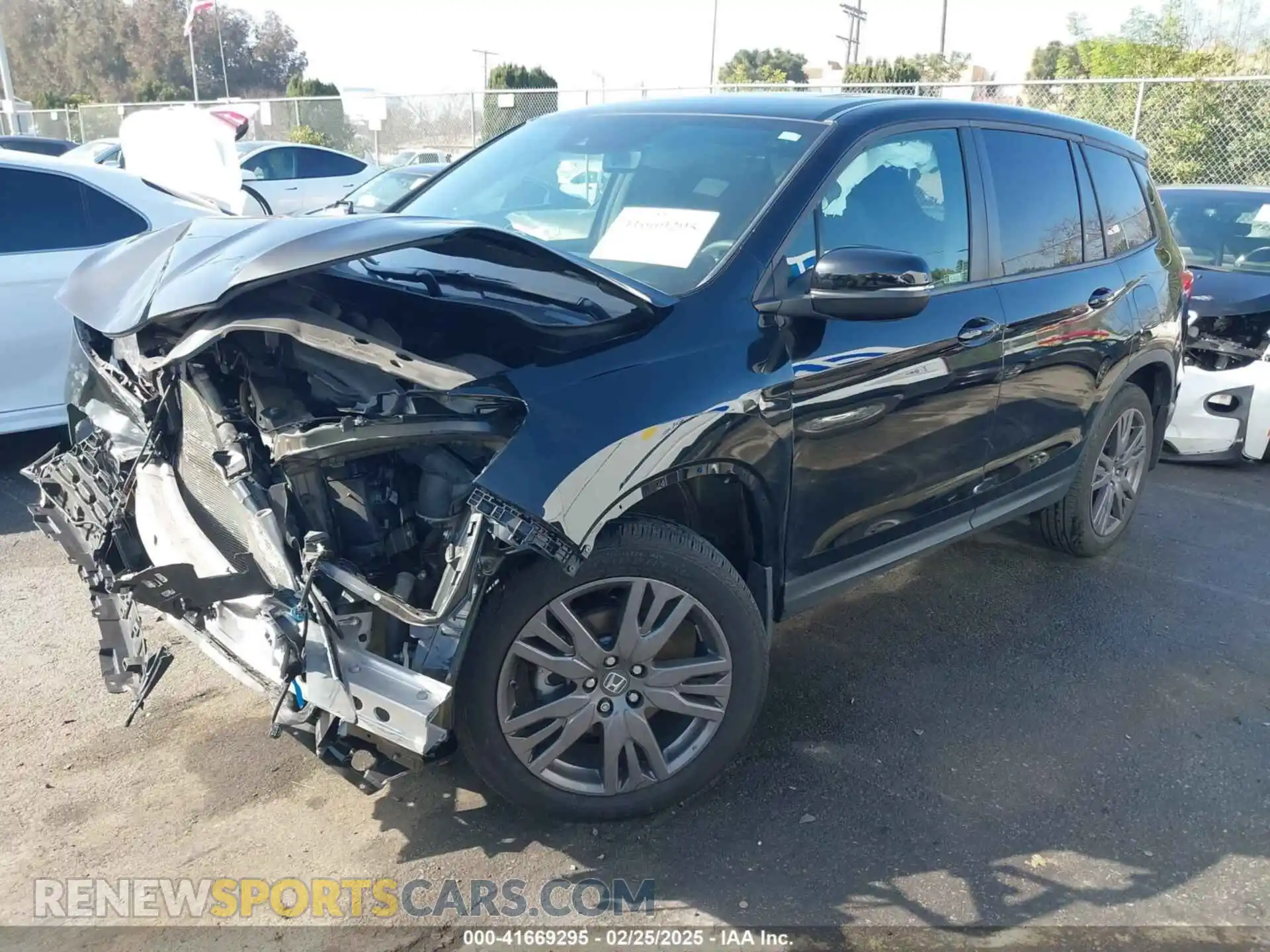 2 Photograph of a damaged car 5FNYF7H5XMB013923 HONDA PASSPORT 2021
