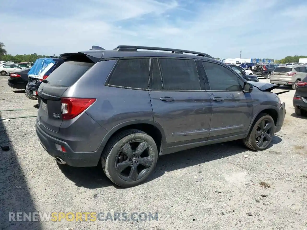 3 Photograph of a damaged car 5FNYF8H08MB014398 HONDA PASSPORT 2021