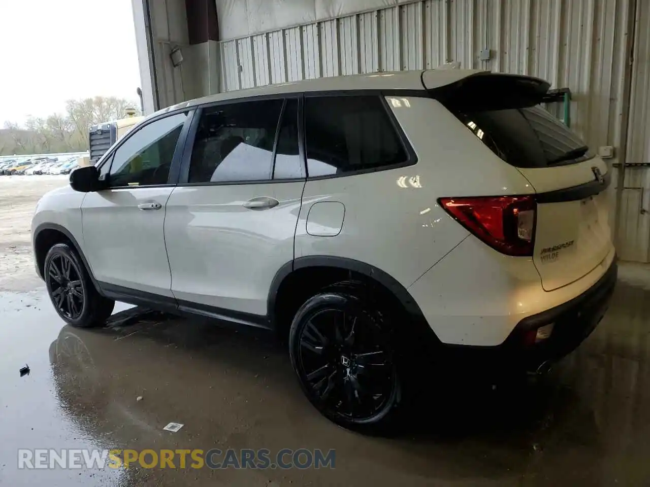 2 Photograph of a damaged car 5FNYF8H23MB015931 HONDA PASSPORT 2021