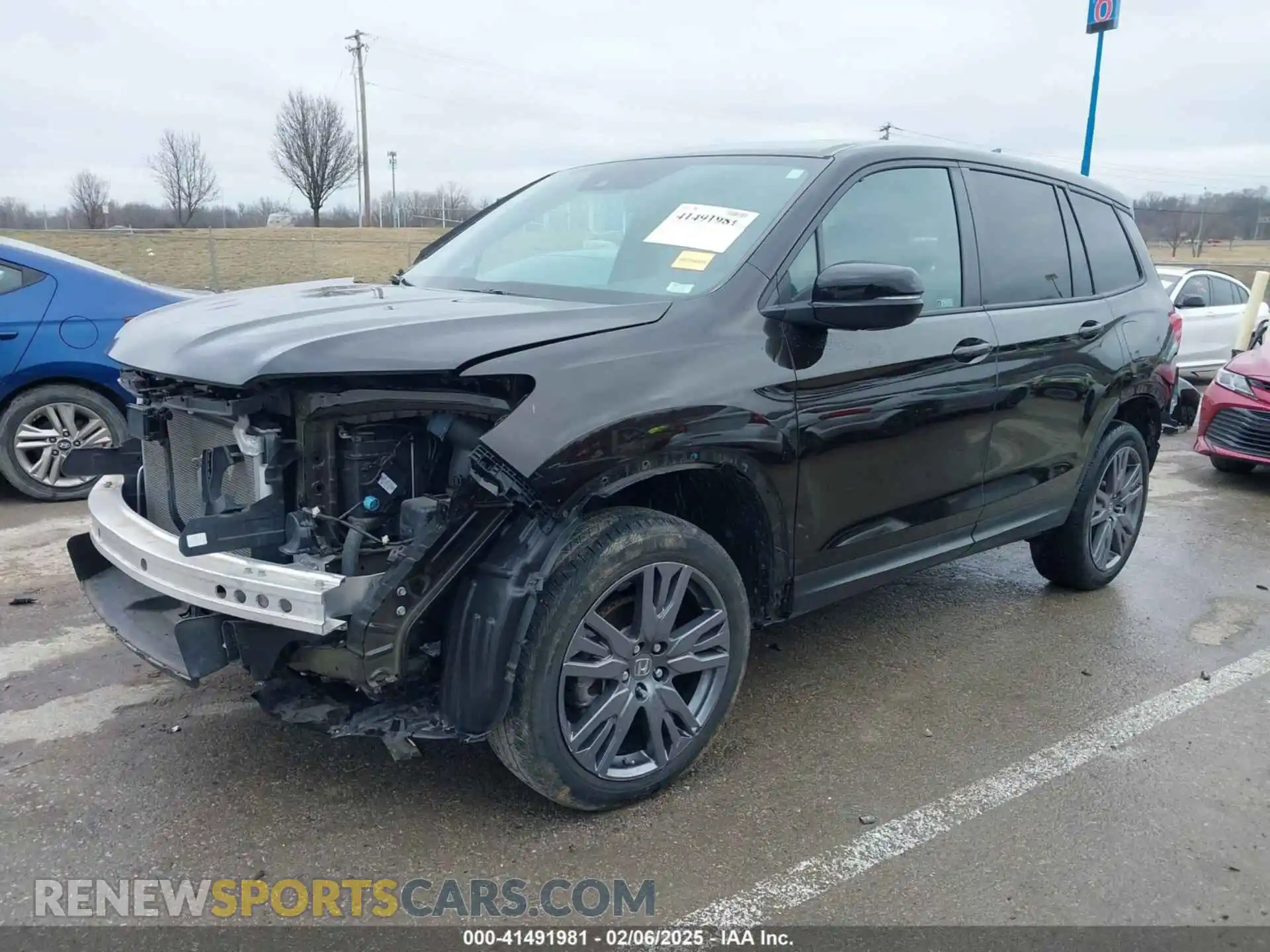 2 Photograph of a damaged car 5FNYF8H55MB011857 HONDA PASSPORT 2021