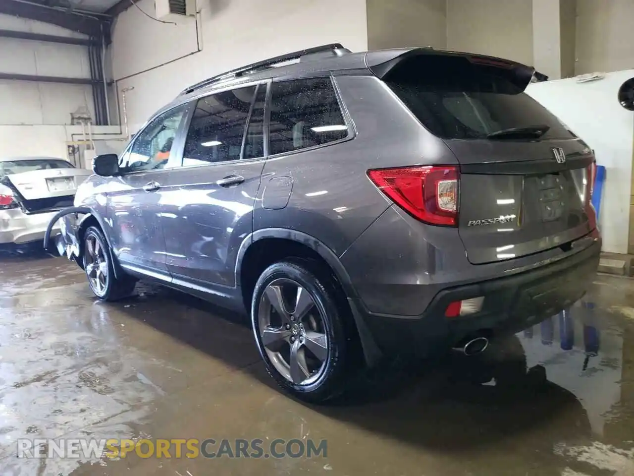 2 Photograph of a damaged car 5FNYF8H98MB012326 HONDA PASSPORT 2021