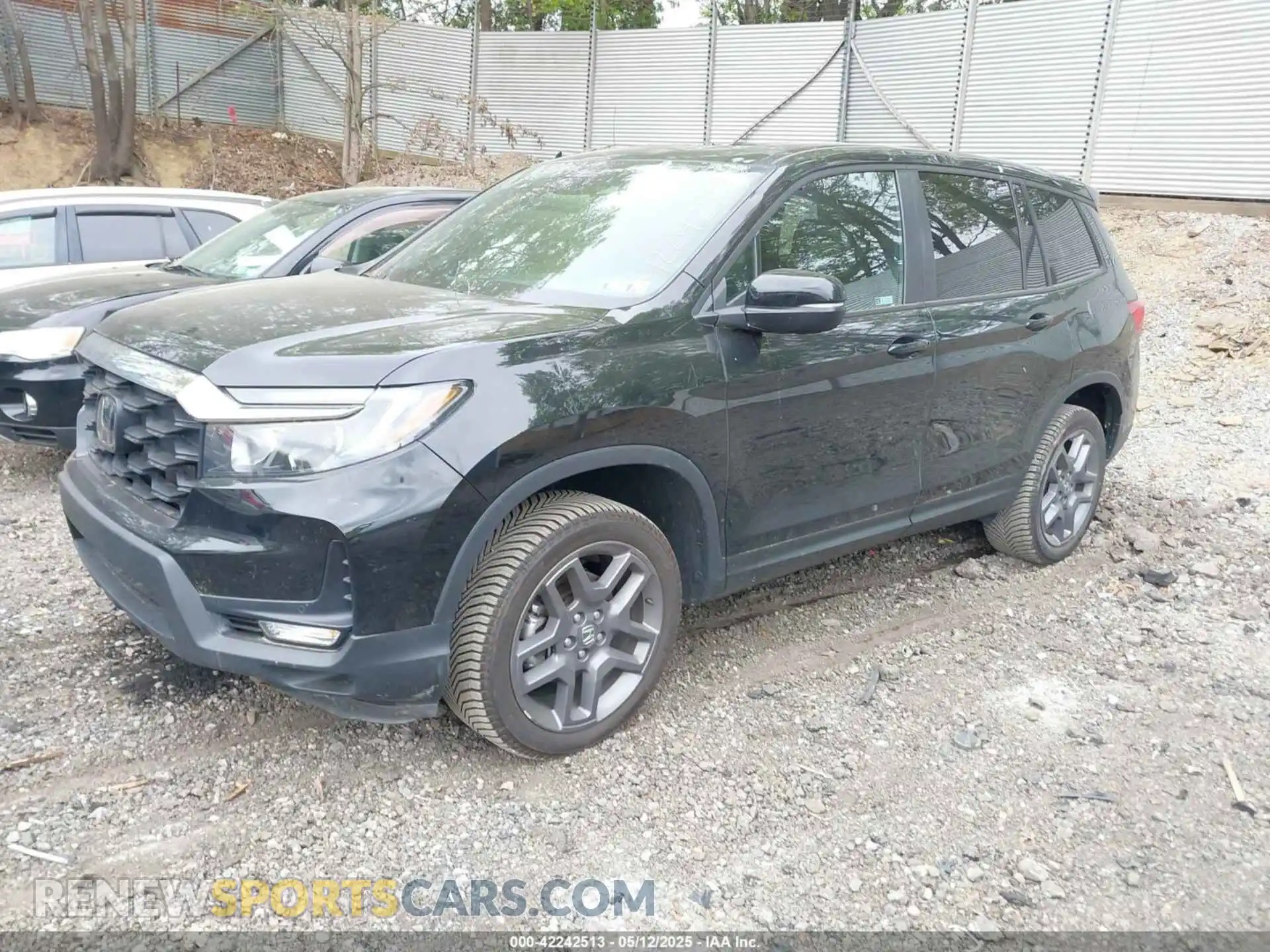 2 Photograph of a damaged car 5FNYF8H53PB011859 HONDA PASSPORT 2023