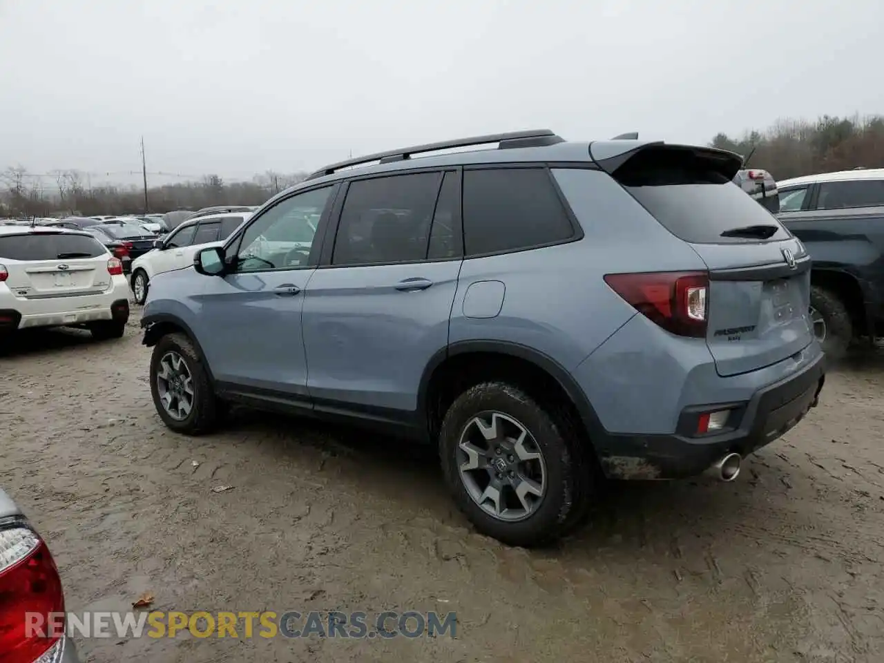 2 fotografías del automóvil dañado 5FNYF8H68PB016340 HONDA PASSPORT 2023