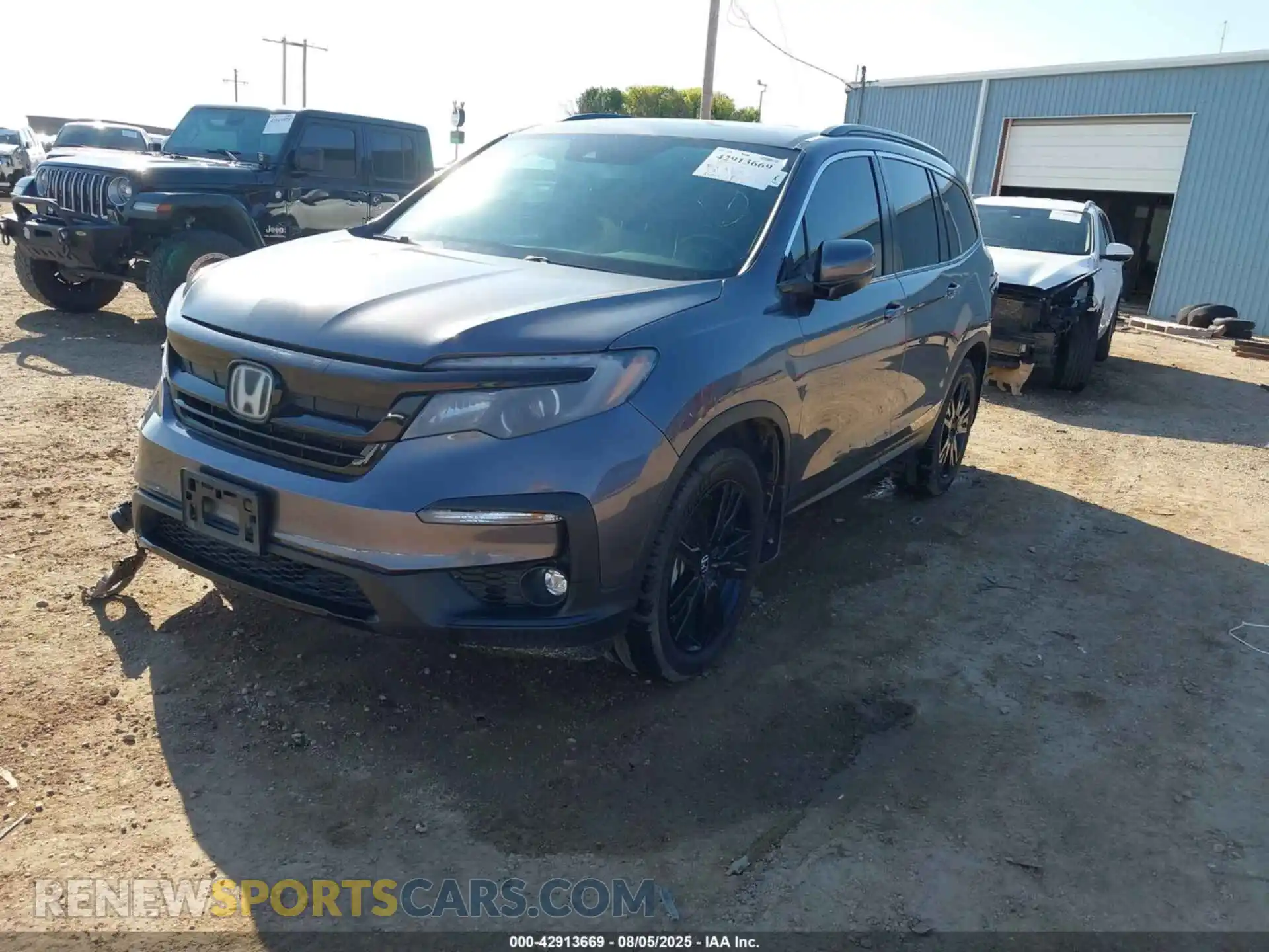 2 Photograph of a damaged car 5FNYF5H23MB038446 HONDA PILOT 2021