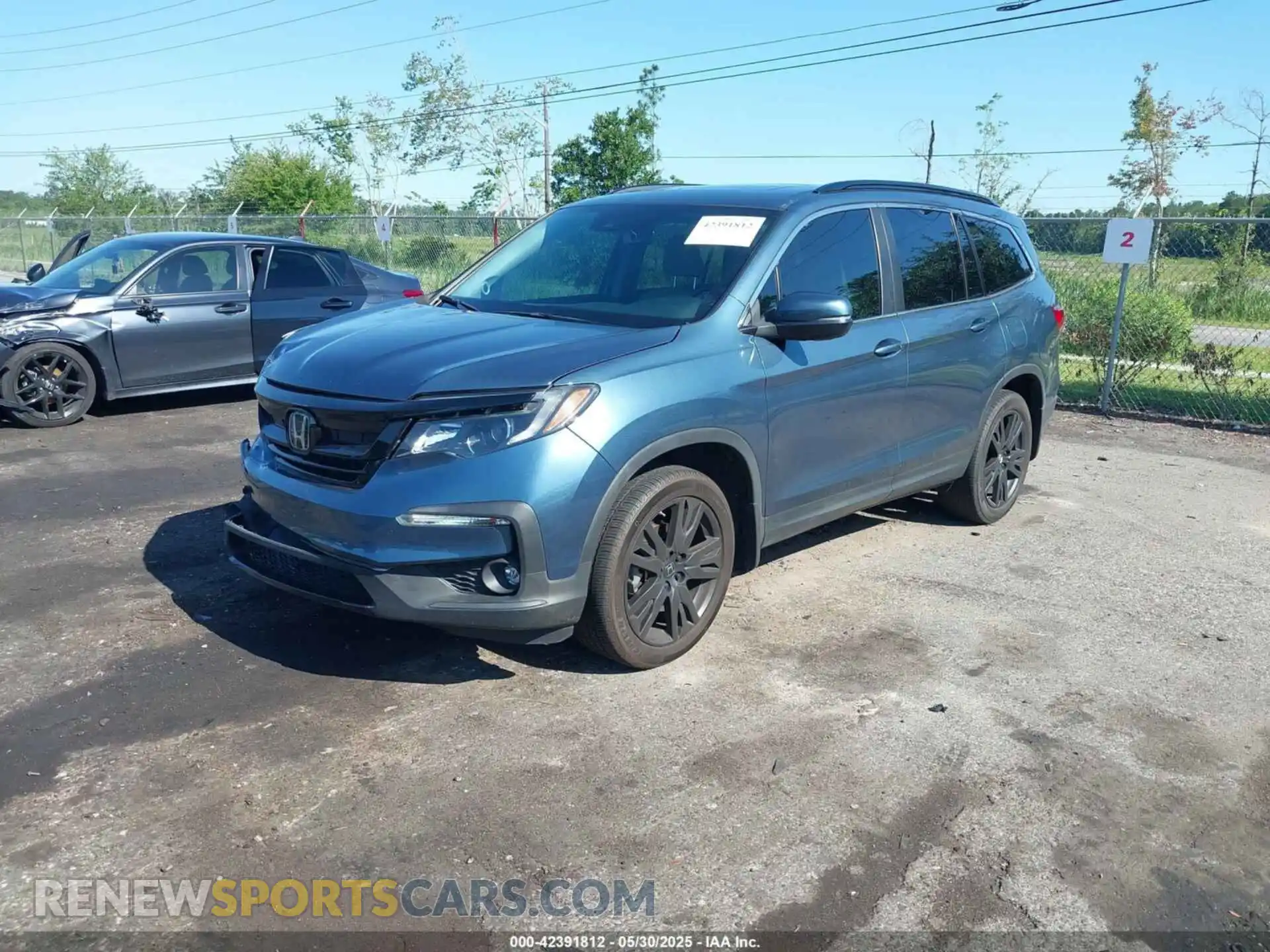 2 Photograph of a damaged car 5FNYF5H27MB012769 HONDA PILOT 2021