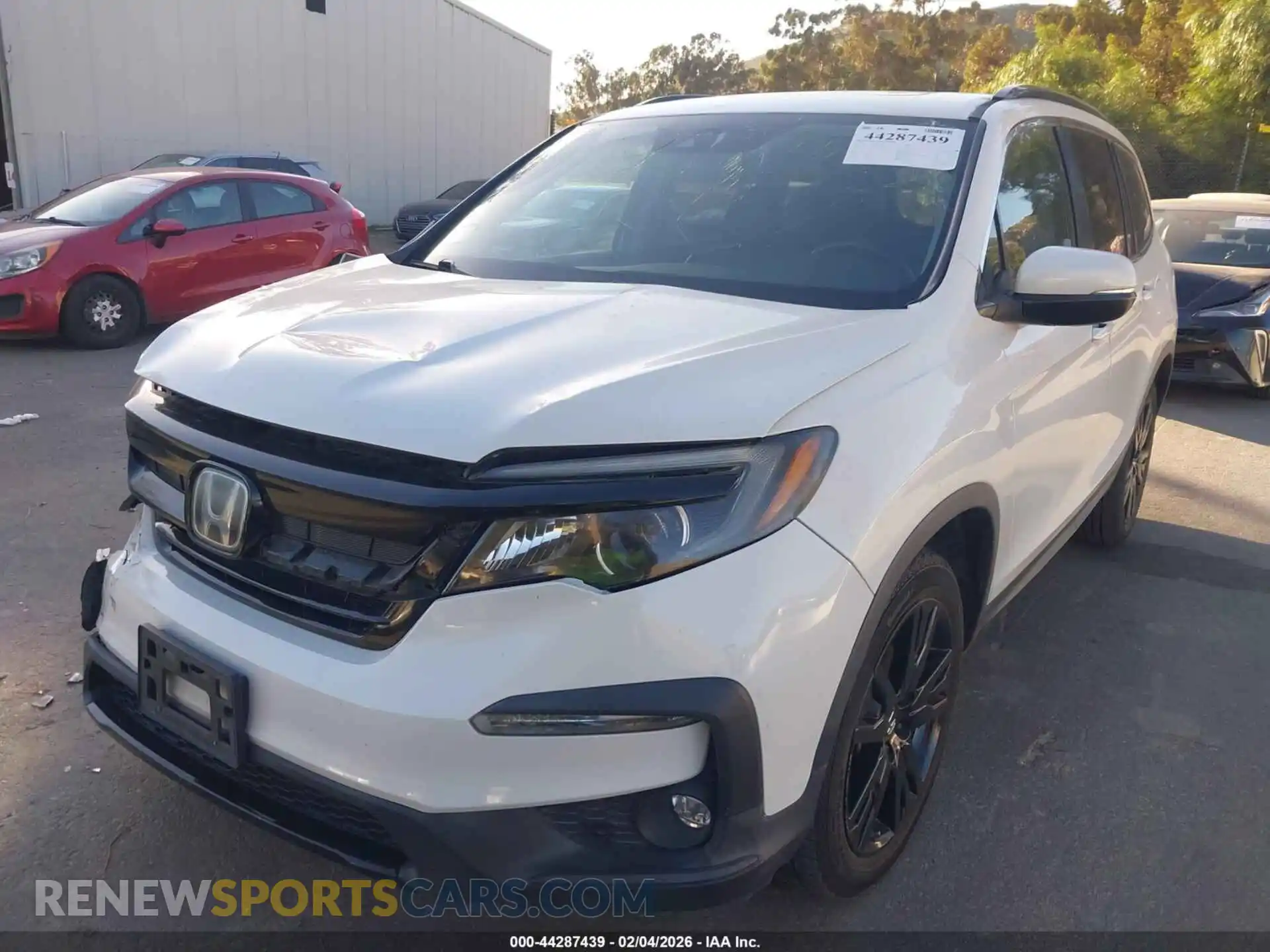 2 Photograph of a damaged car 5FNYF5H29MB023854 HONDA PILOT 2021
