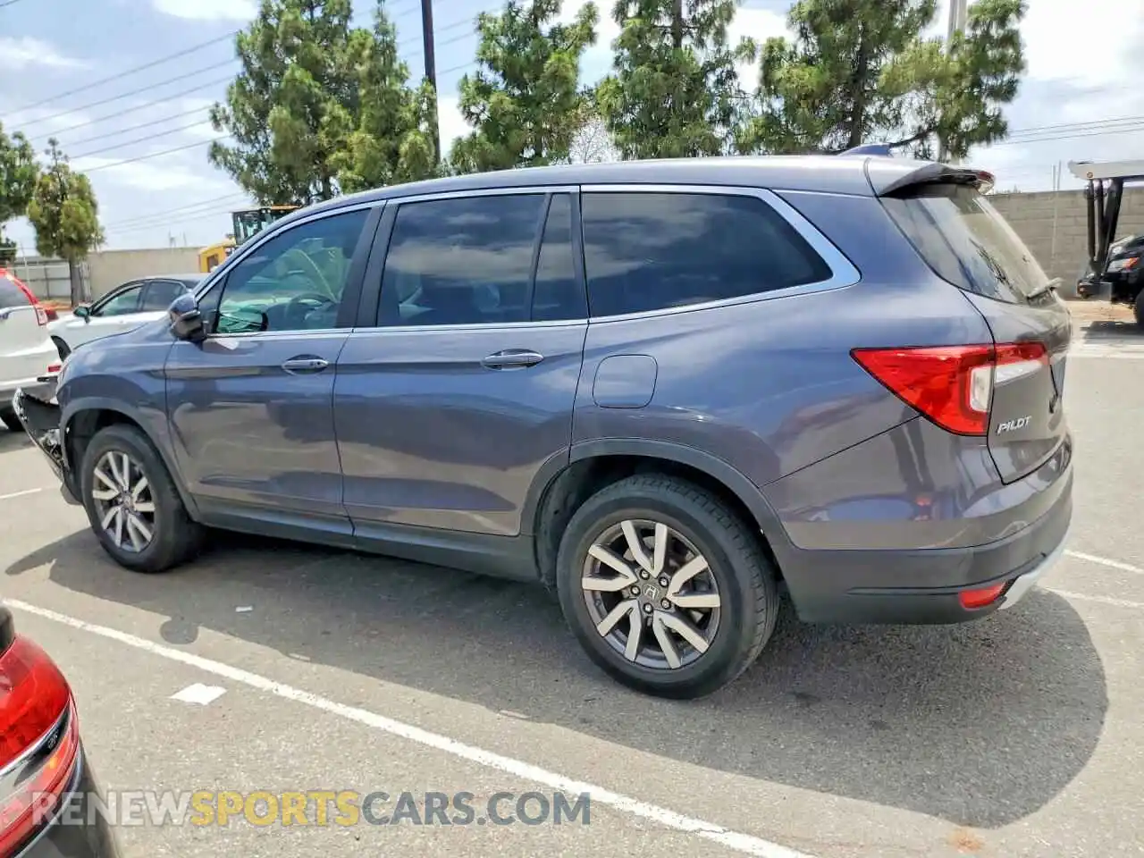 2 fotografías del automóvil dañado 5FNYF5H50MB026121 HONDA PILOT 2021