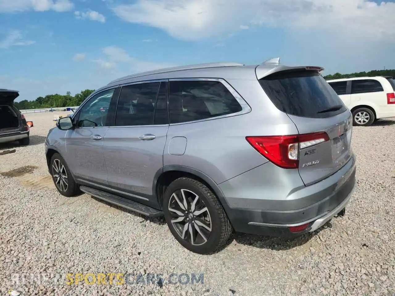 2 fotografías del automóvil dañado 5FNYF5H62MB000676 HONDA PILOT 2021