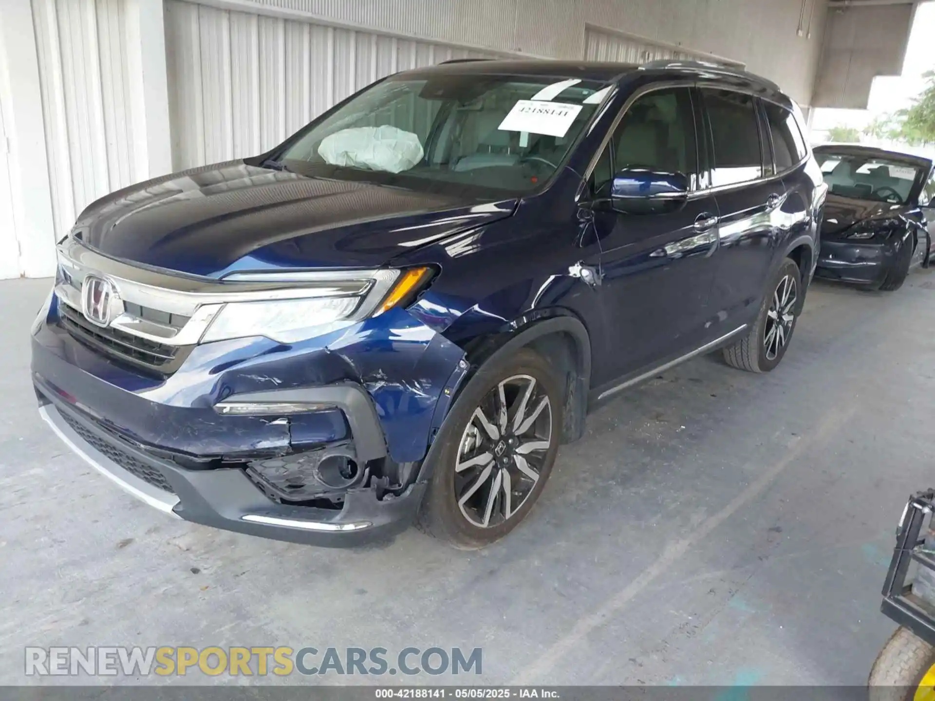2 fotografías del automóvil dañado 5FNYF5H93MB002463 HONDA PILOT 2021