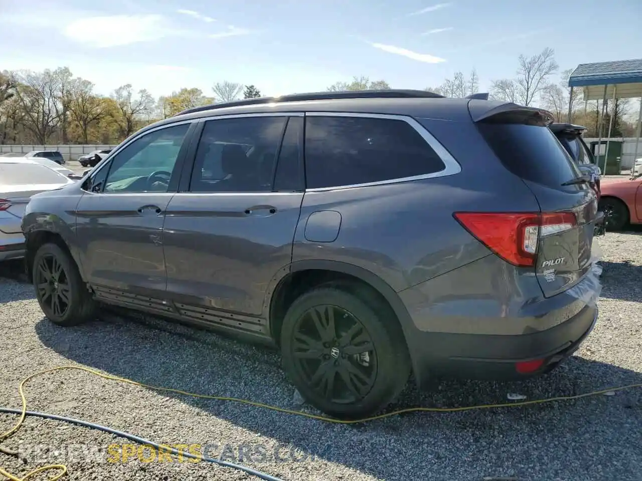 2 Photograph of a damaged car 5FNYF5H23NB023656 HONDA PILOT 2022