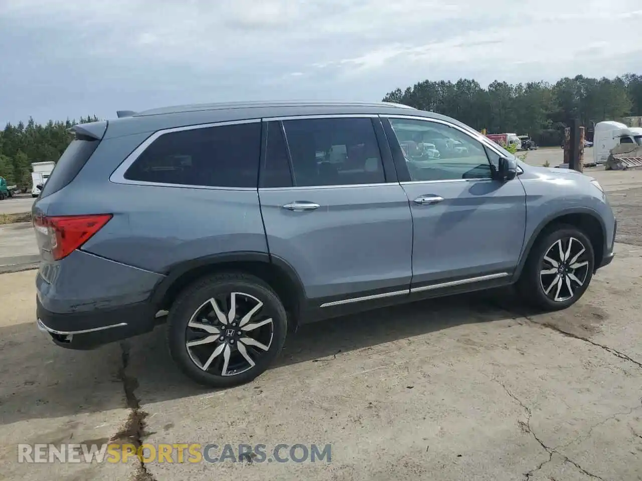 3 Photograph of a damaged car 5FNYF5H69NB031540 HONDA PILOT 2022