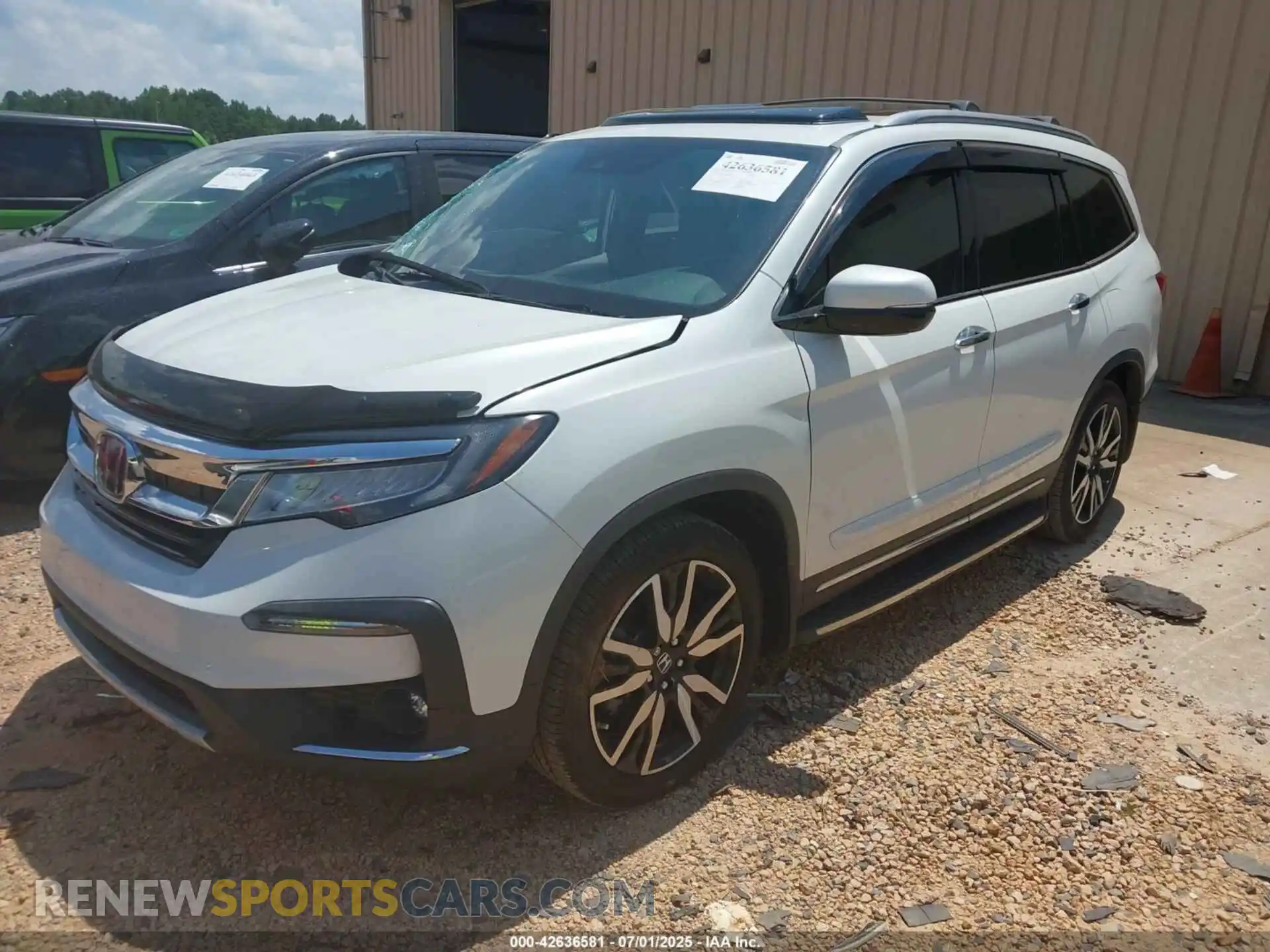 2 Photograph of a damaged car 5FNYF5H96NB004676 HONDA PILOT 2022