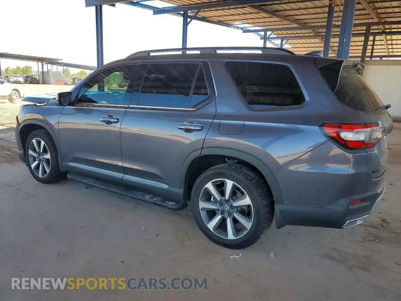 2 fotografías del automóvil dañado 5FNYG1H83PB035383 HONDA PILOT 2023
