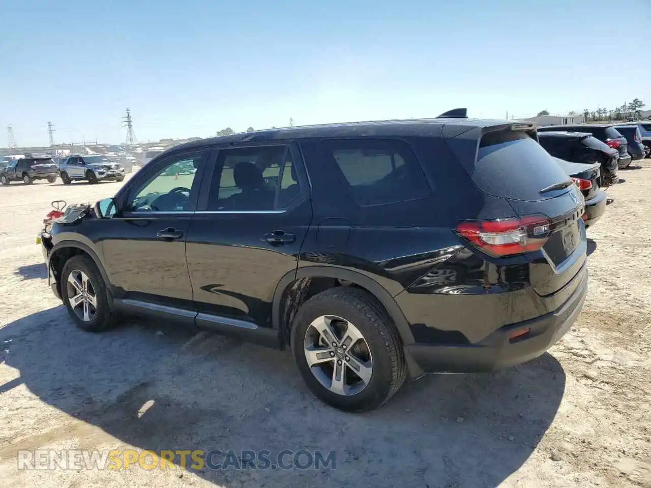 2 Photograph of a damaged car 5FNYG2H49PB009440 HONDA PILOT 2023