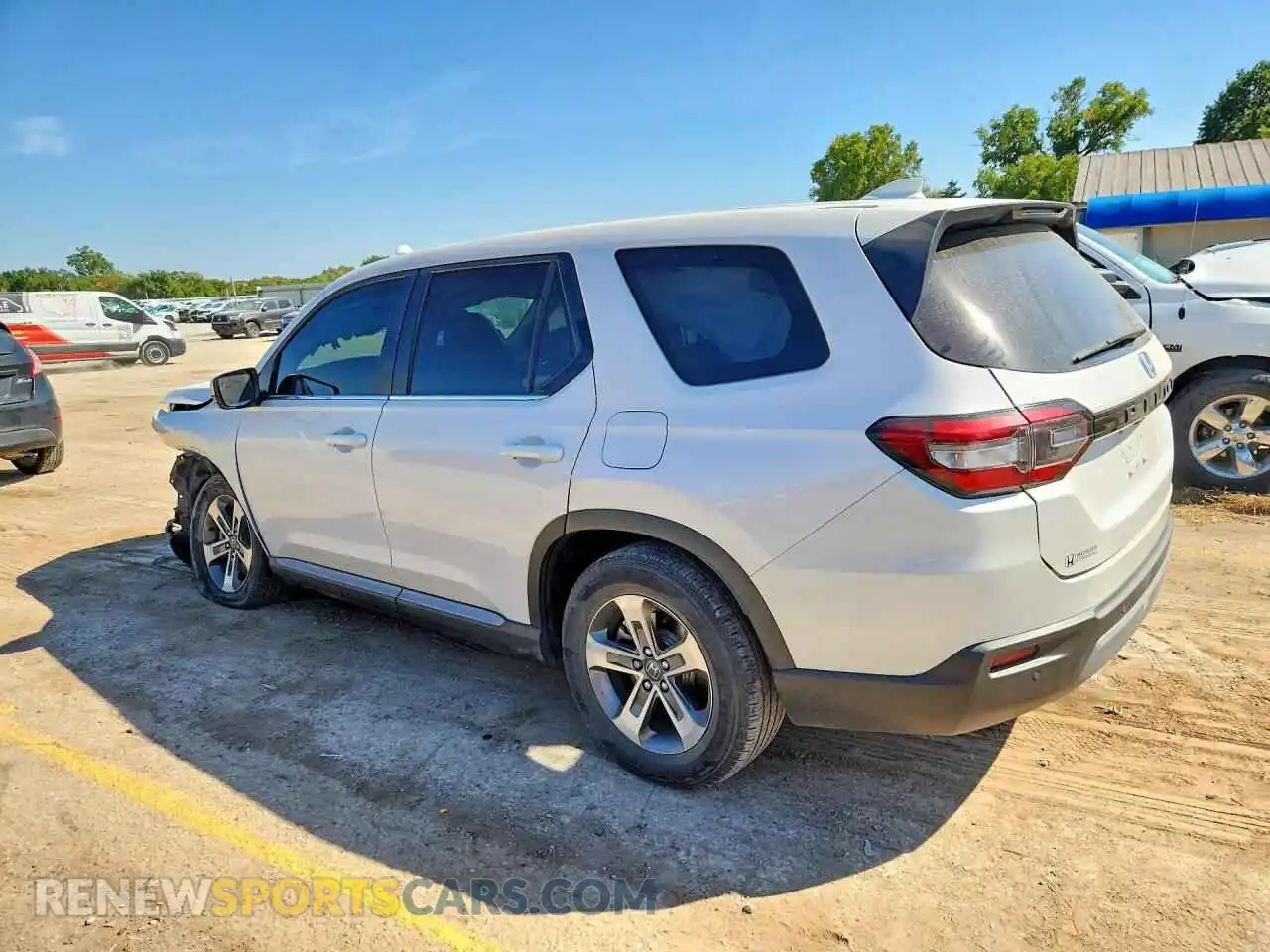 2 Photograph of a damaged car 5FNYG2H49PB009860 HONDA PILOT 2023