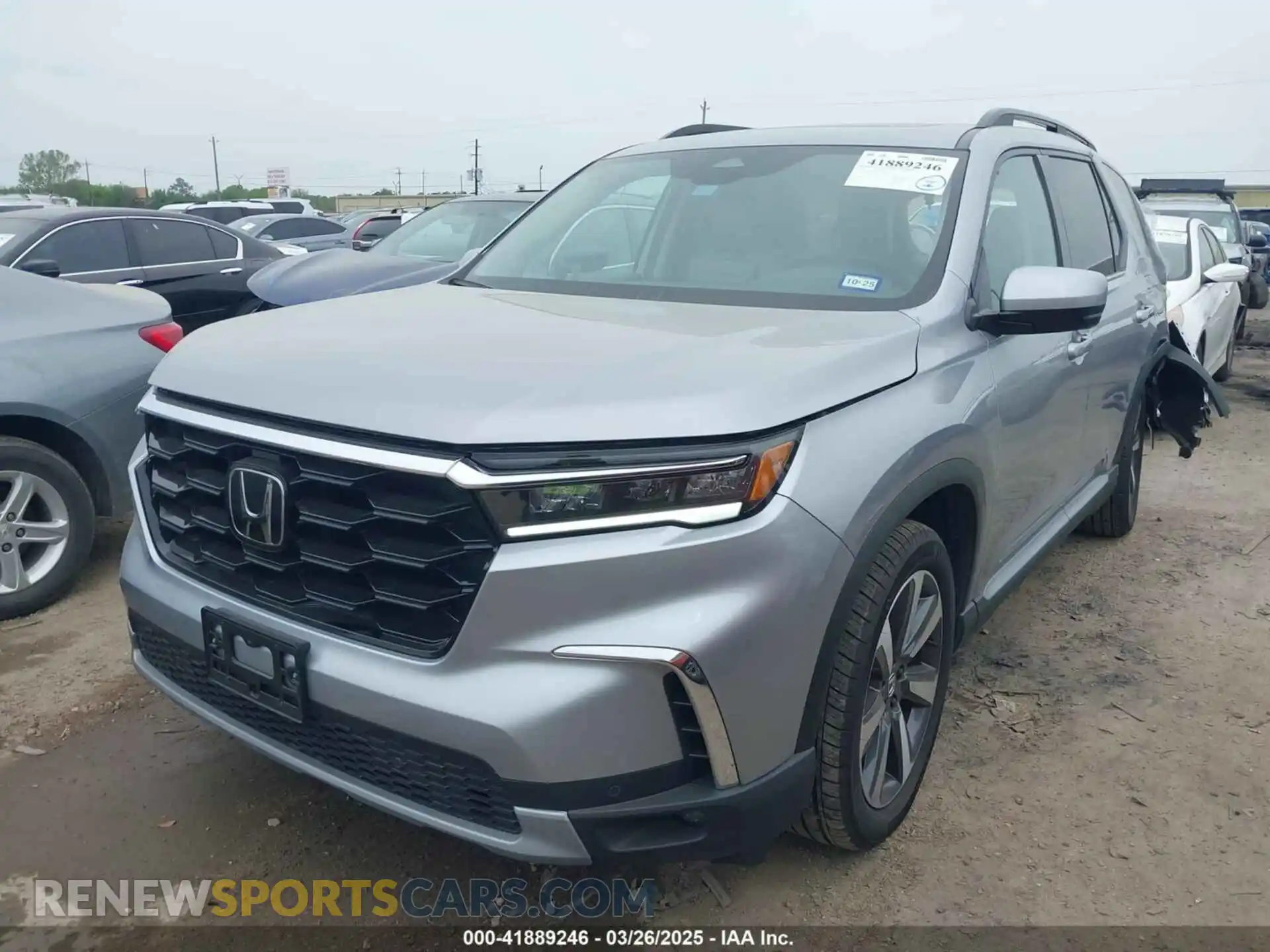 2 fotografías del automóvil dañado 5FNYG2H75PB014662 HONDA PILOT 2023