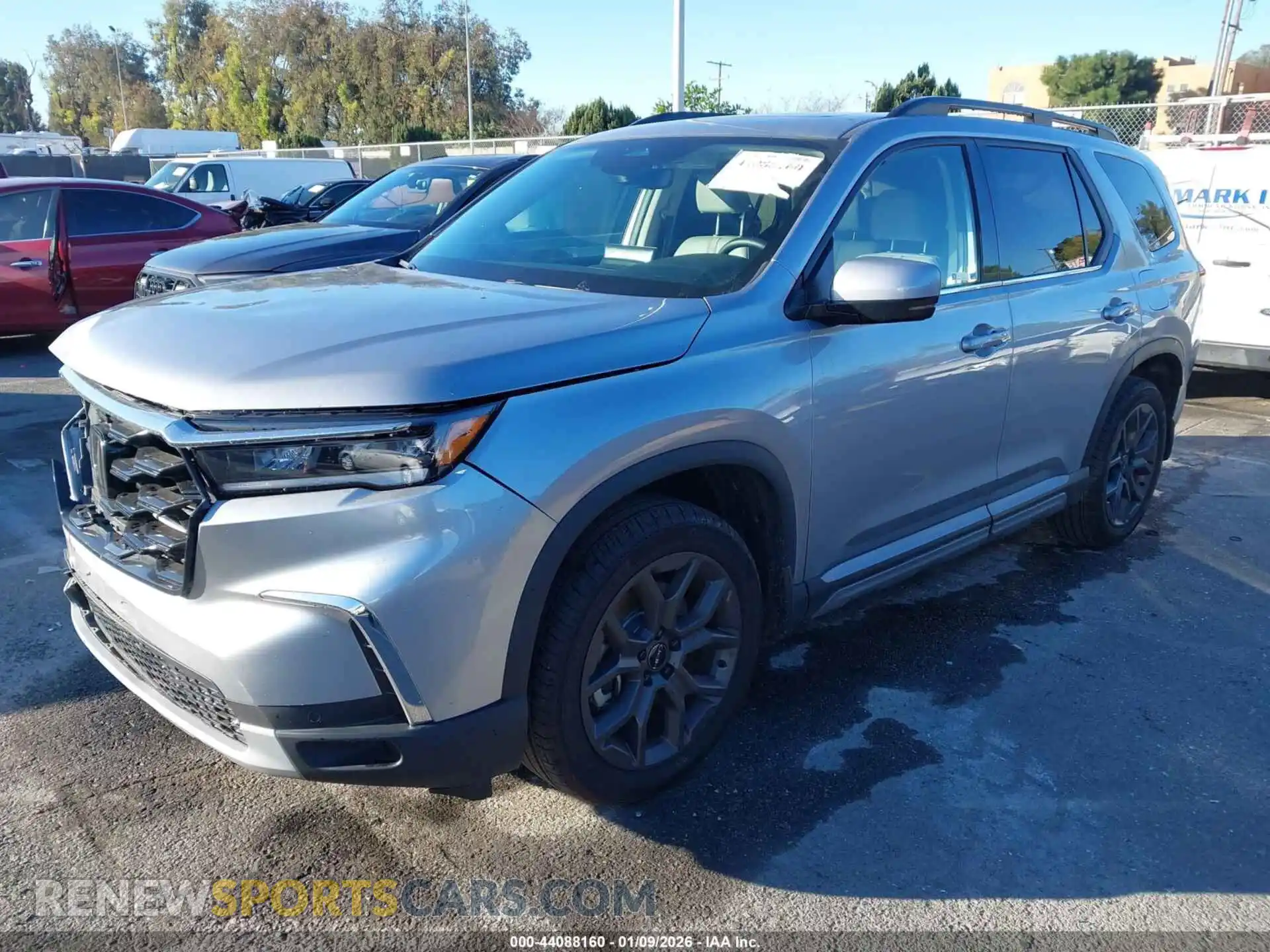 2 fotografías del automóvil dañado 5FNYG2H77RB004203 HONDA PILOT 2024