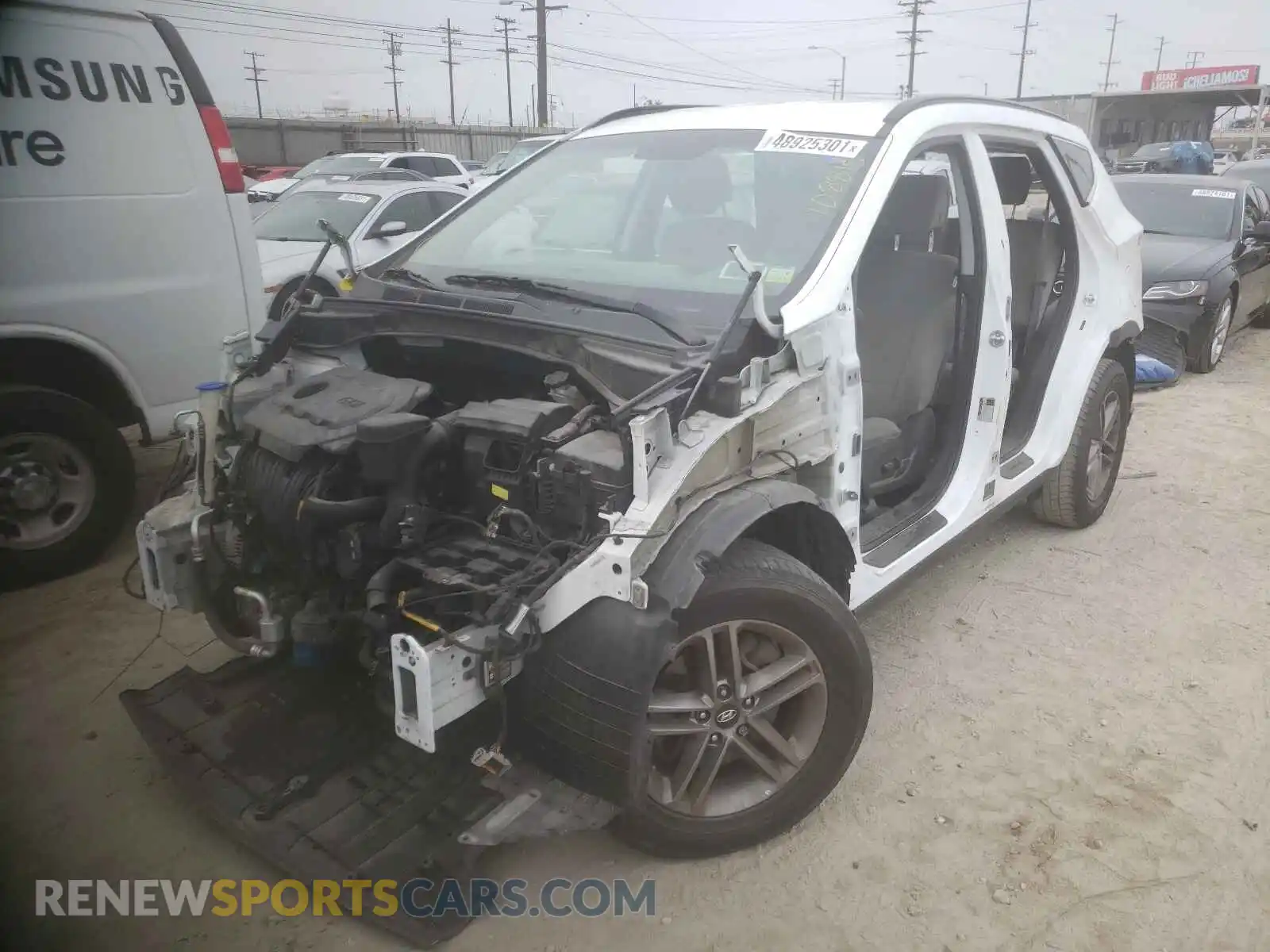 2 Photograph of a damaged car 5NMZUDLB0HH031812 HYUNDAI SANTA FE 2017