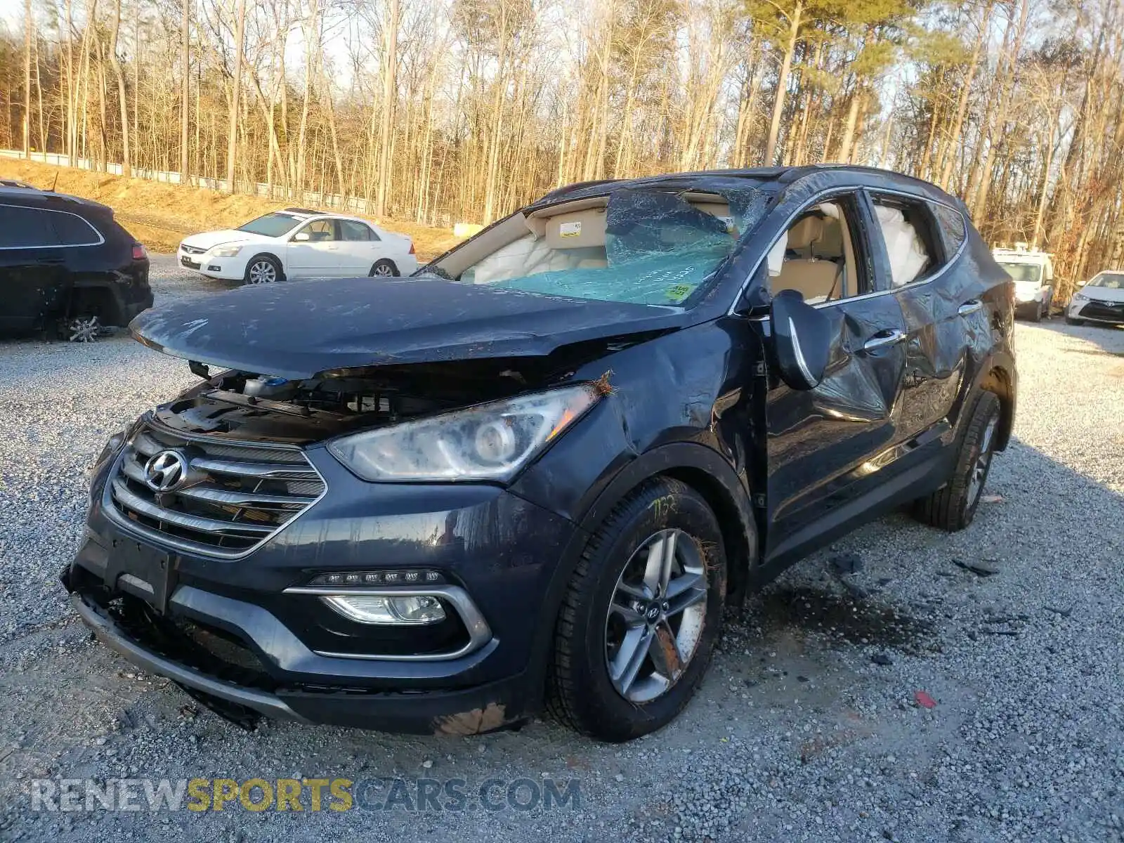 2 Photograph of a damaged car 5NMZUDLB6HH044225 HYUNDAI SANTA FE 2017