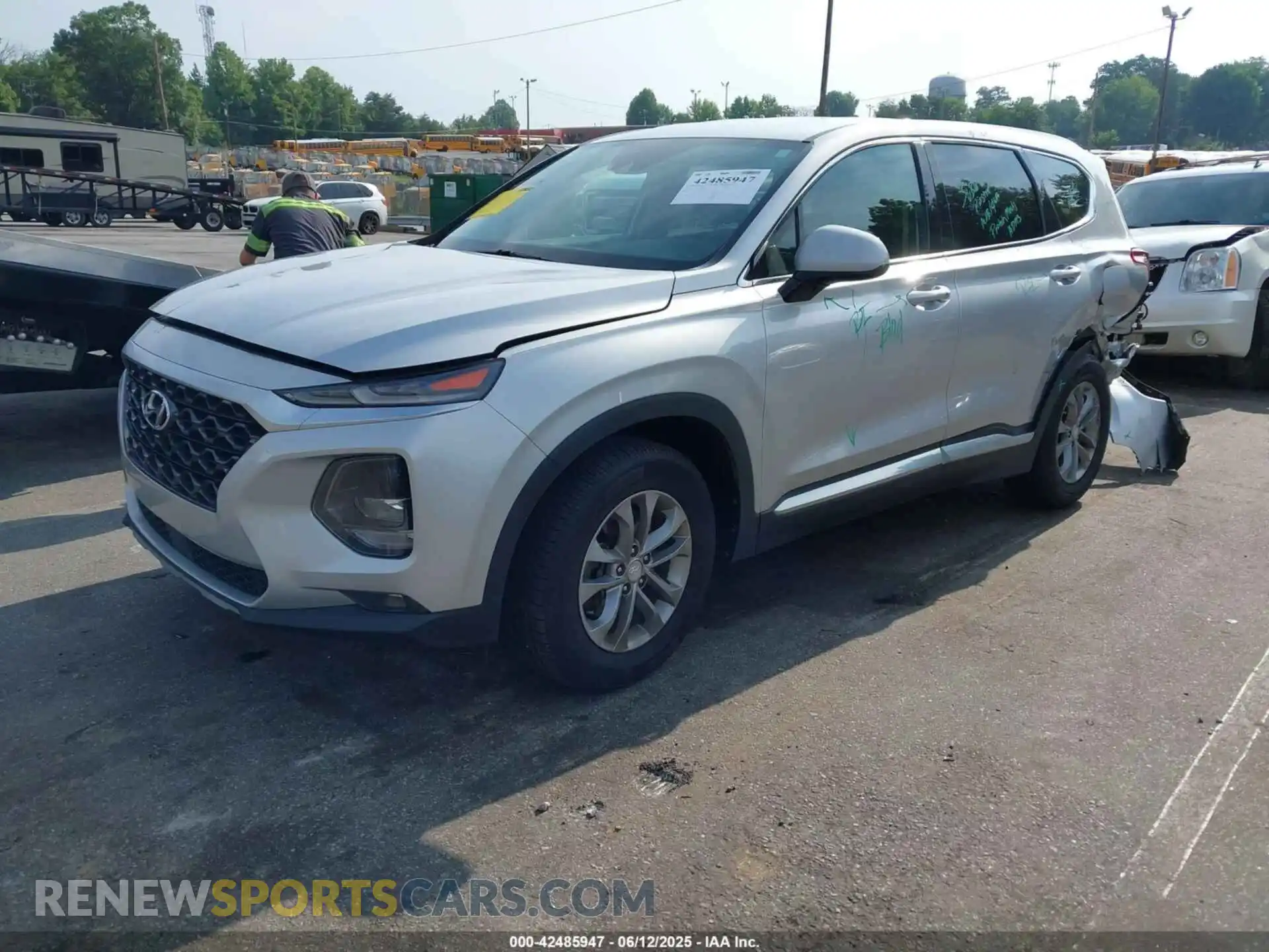 2 fotografías del automóvil dañado 5NMS3CAD6KH047216 HYUNDAI SANTA FE 2019