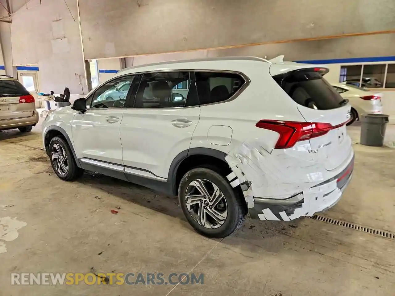 2 fotografías del automóvil dañado 5NMS6DAJ2MH325678 HYUNDAI SANTA FE 2021