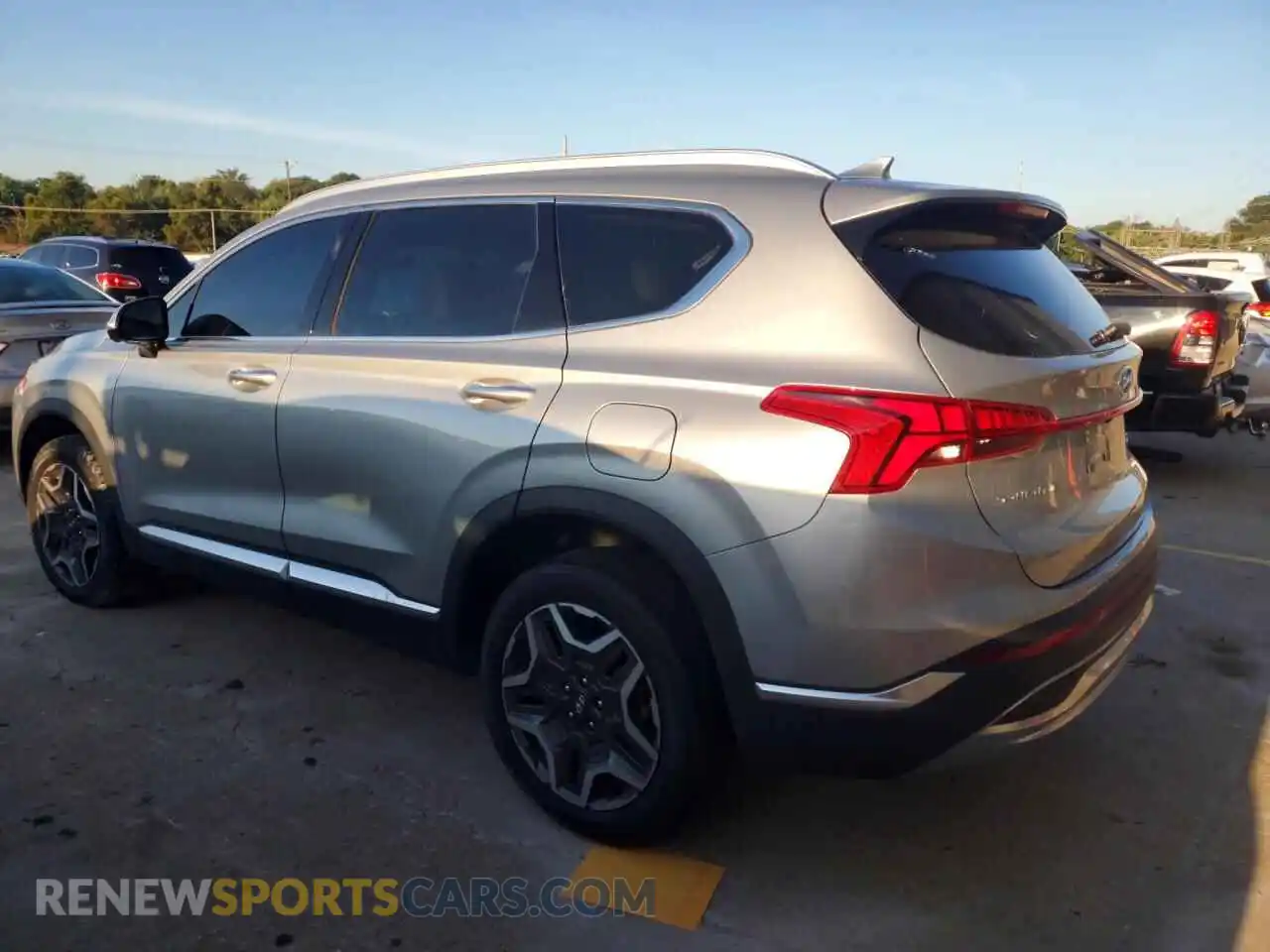 2 fotografías del automóvil dañado 5NMS4DAL0PH653418 HYUNDAI SANTA FE 2023