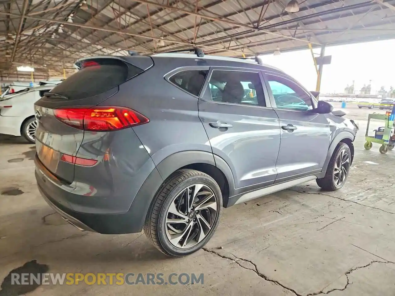3 Photograph of a damaged car KM8J33AL6MU401861 HYUNDAI TUCSON 2021