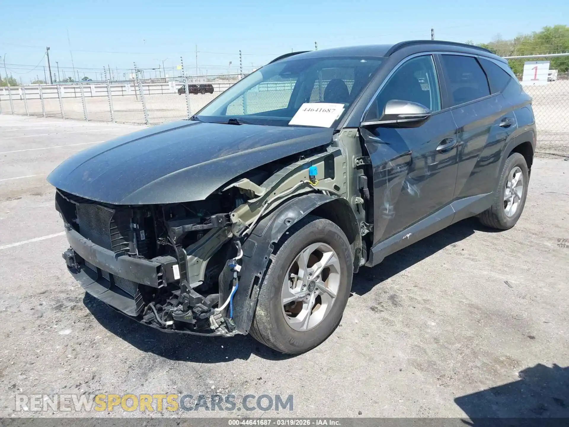 2 fotografías del automóvil dañado 5NMJBCAE1NH125879 HYUNDAI TUCSON 2022