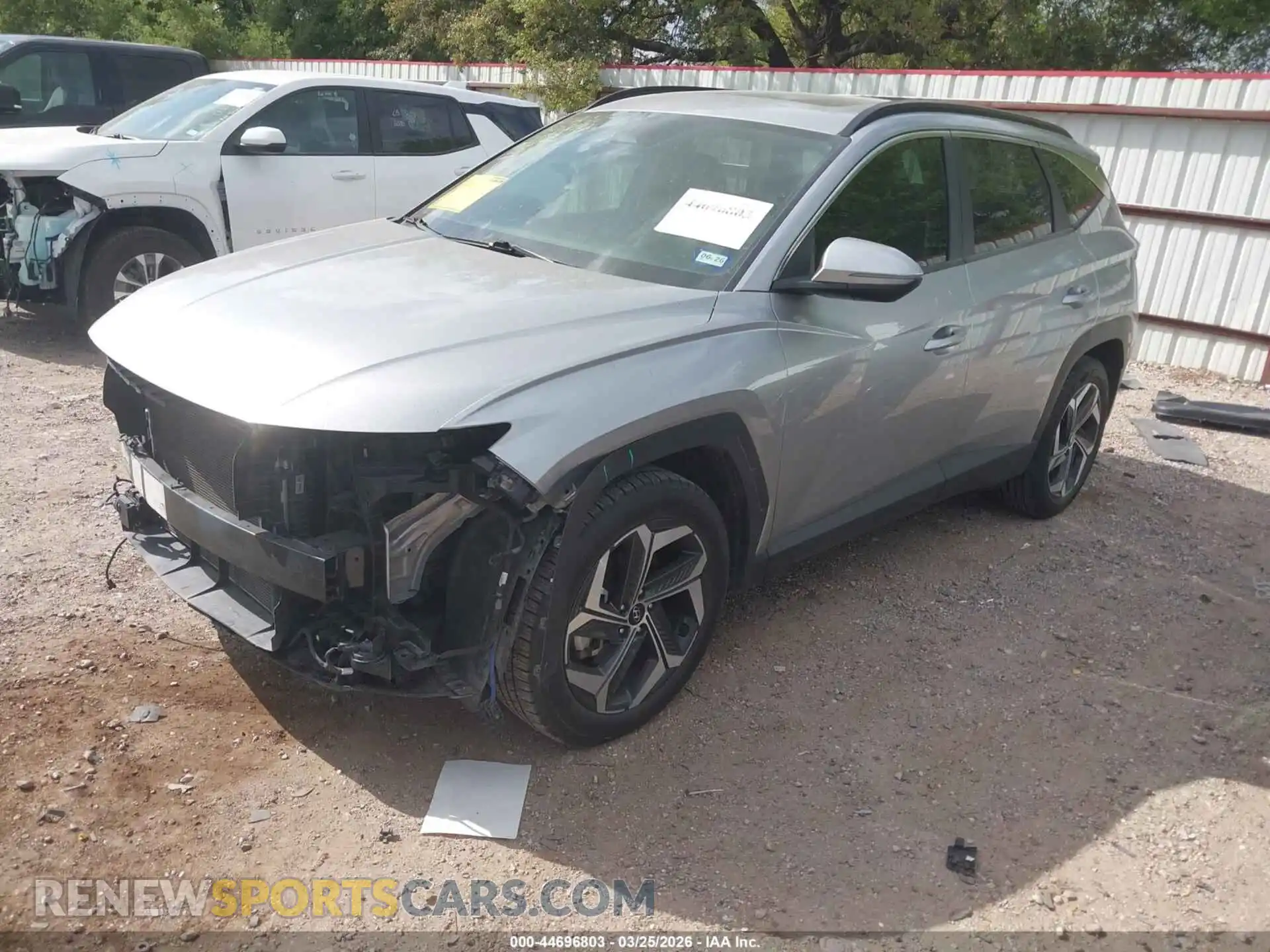 2 fotografías del automóvil dañado 5NMJC3AE0NH007769 HYUNDAI TUCSON 2022