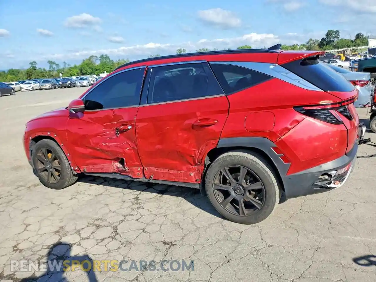 2 fotografías del automóvil dañado 5NMJE3AE8NH008467 HYUNDAI TUCSON 2022