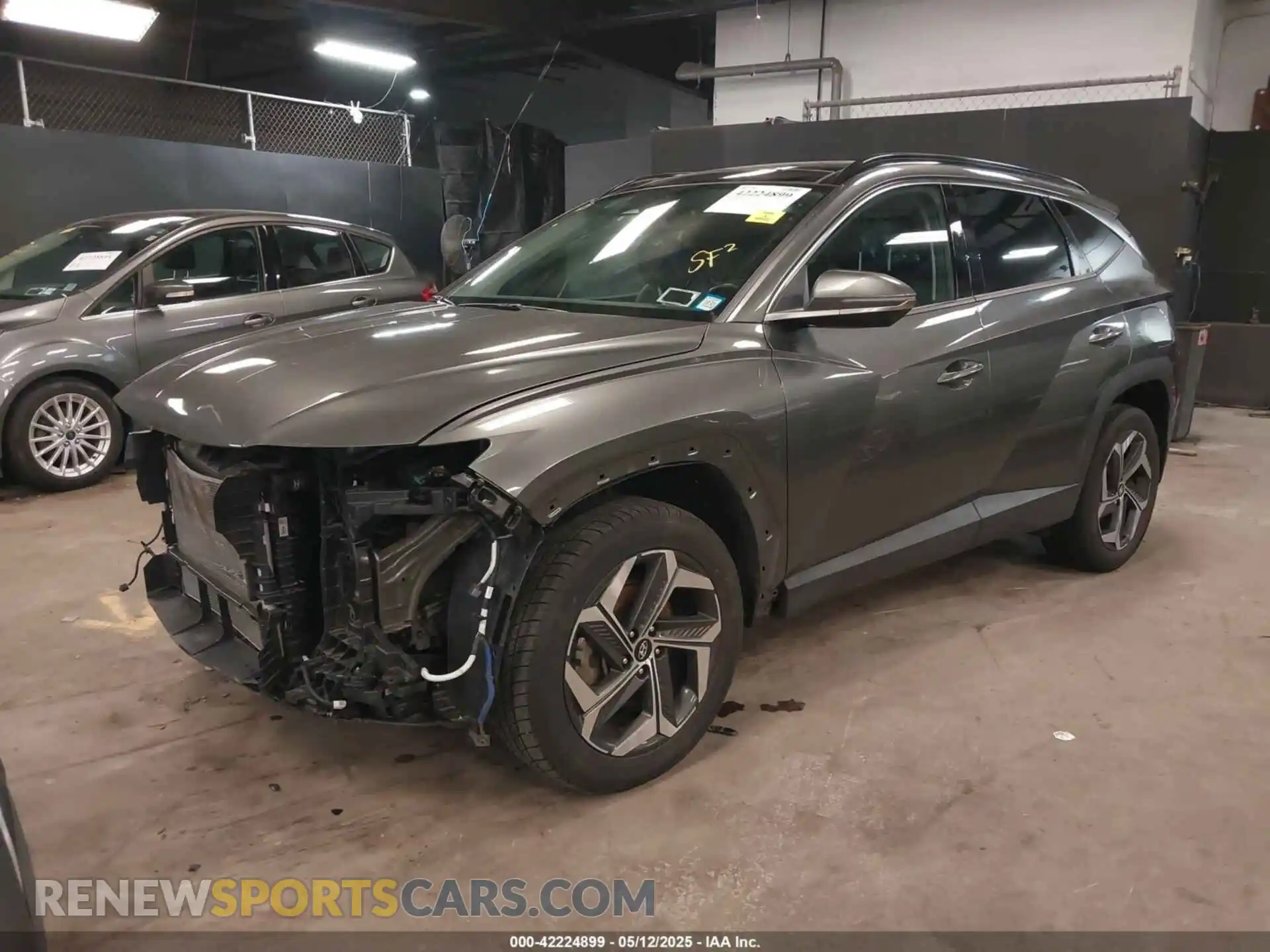 2 Photograph of a damaged car 5NMJECAE7NH075495 HYUNDAI TUCSON 2022