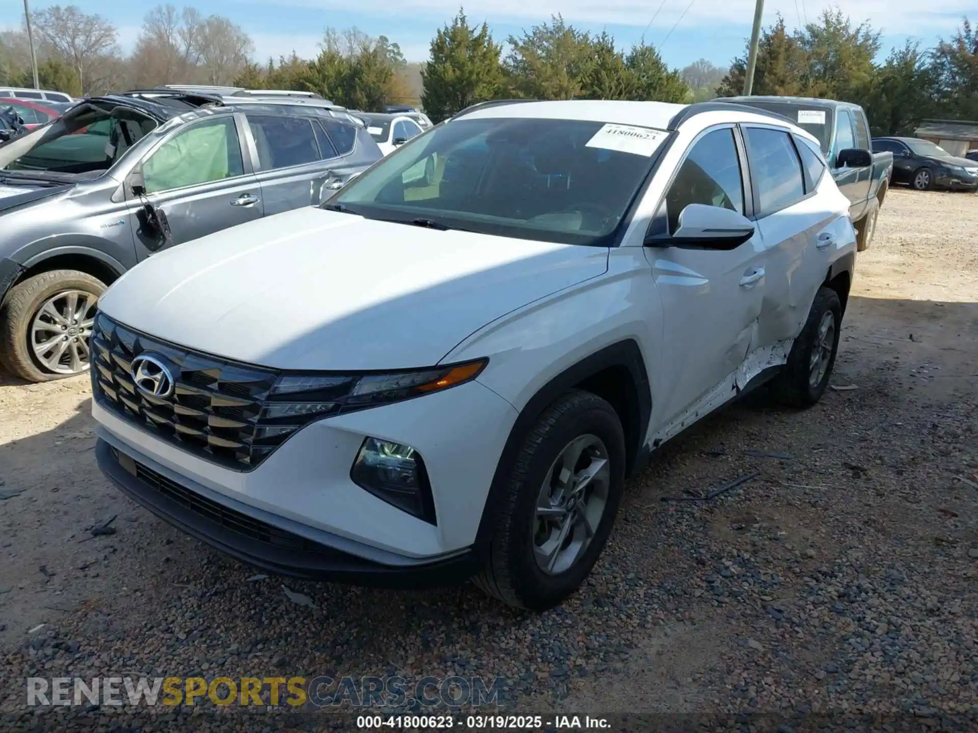 2 fotografías del automóvil dañado 5NMJBCAE2PH190887 HYUNDAI TUCSON 2023