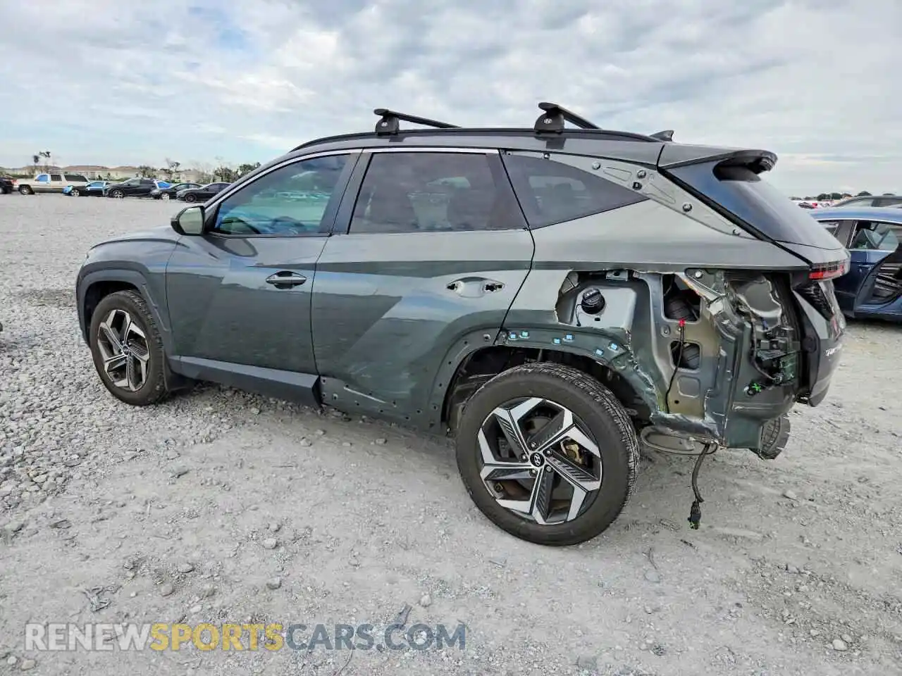 2 fotografías del automóvil dañado 5NMJFCAE4PH206480 HYUNDAI TUCSON 2023
