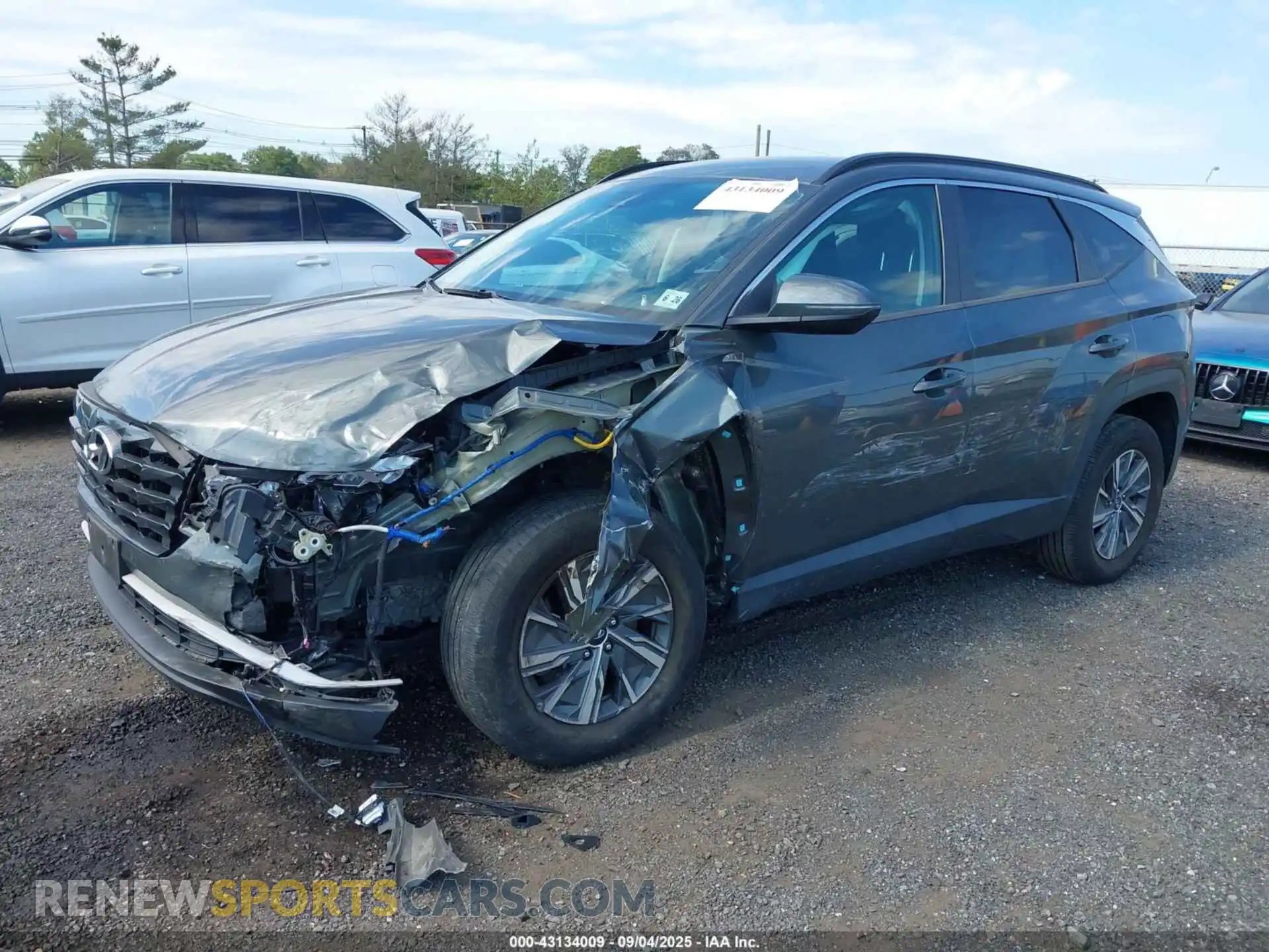 2 Photograph of a damaged car KM8JBCA19NU020489 HYUNDAI TUCSON HYBRID 2022