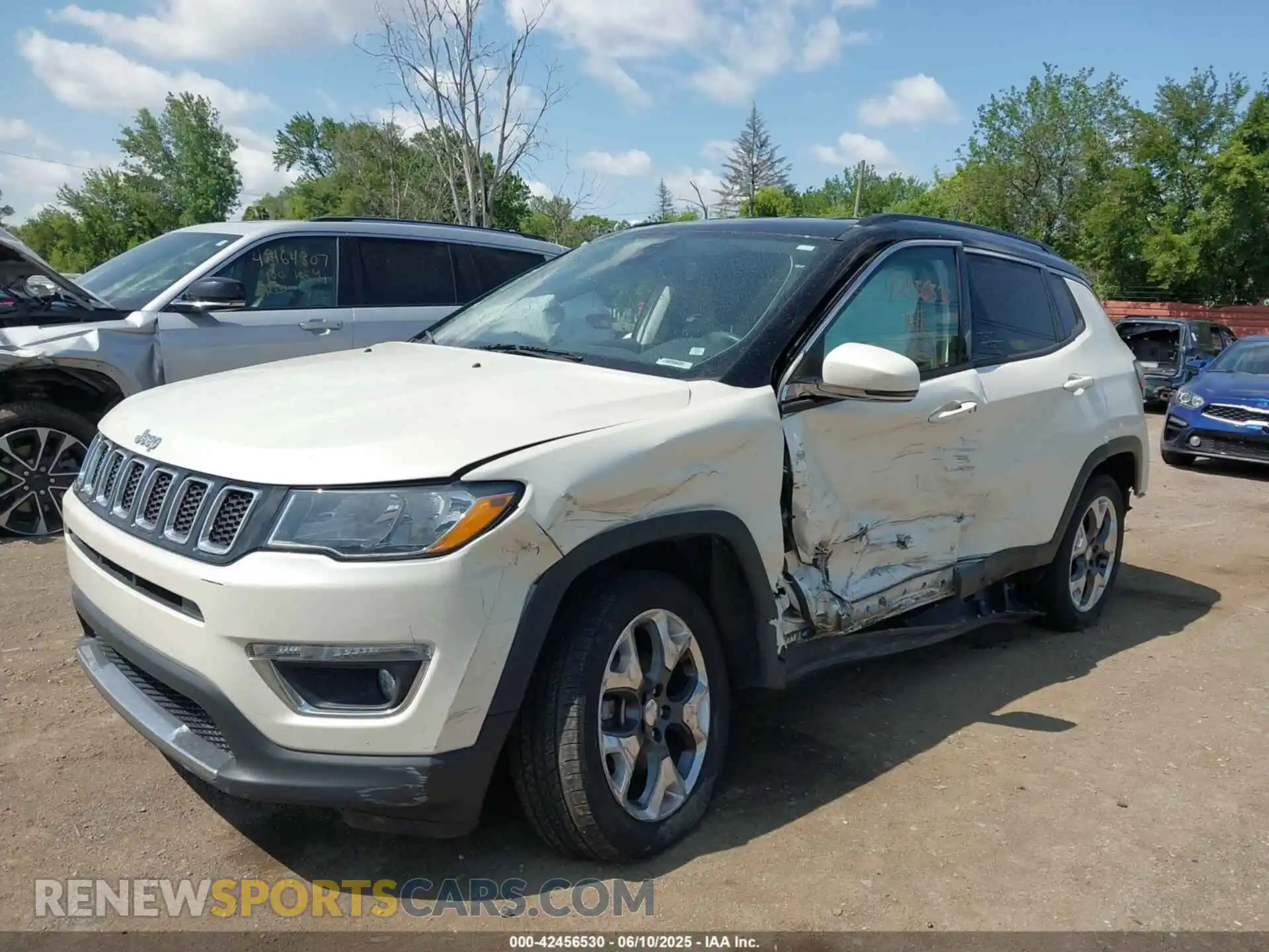 2 Photograph of a damaged car 3C4NJDCB4KT818425 JEEP COMPASS 2019